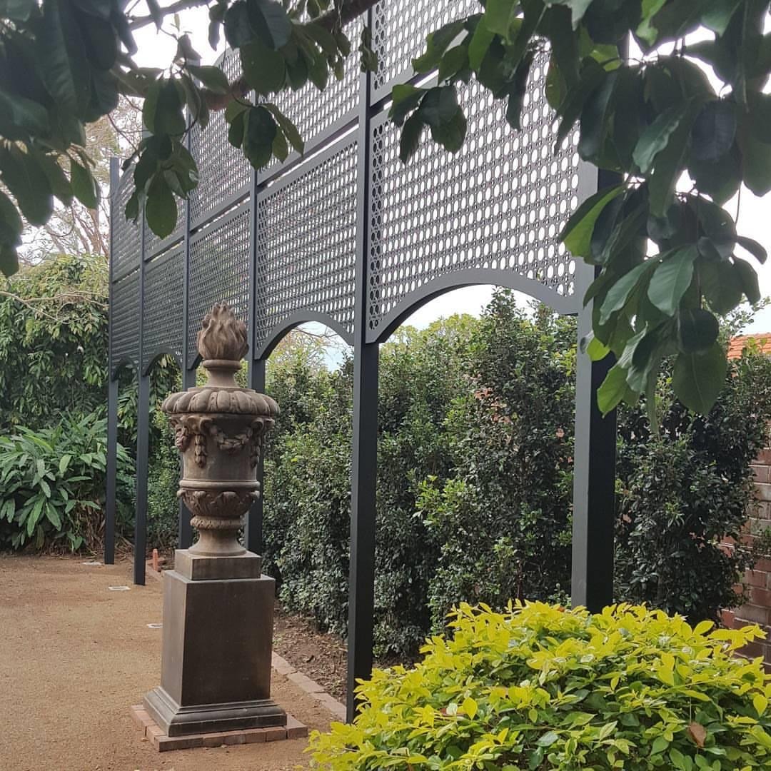 Custom designed laser cut privacy for Heritage Listed home in Ashgrove Brisbane. Design was based on the etched glass details around the original homestead doorway.
