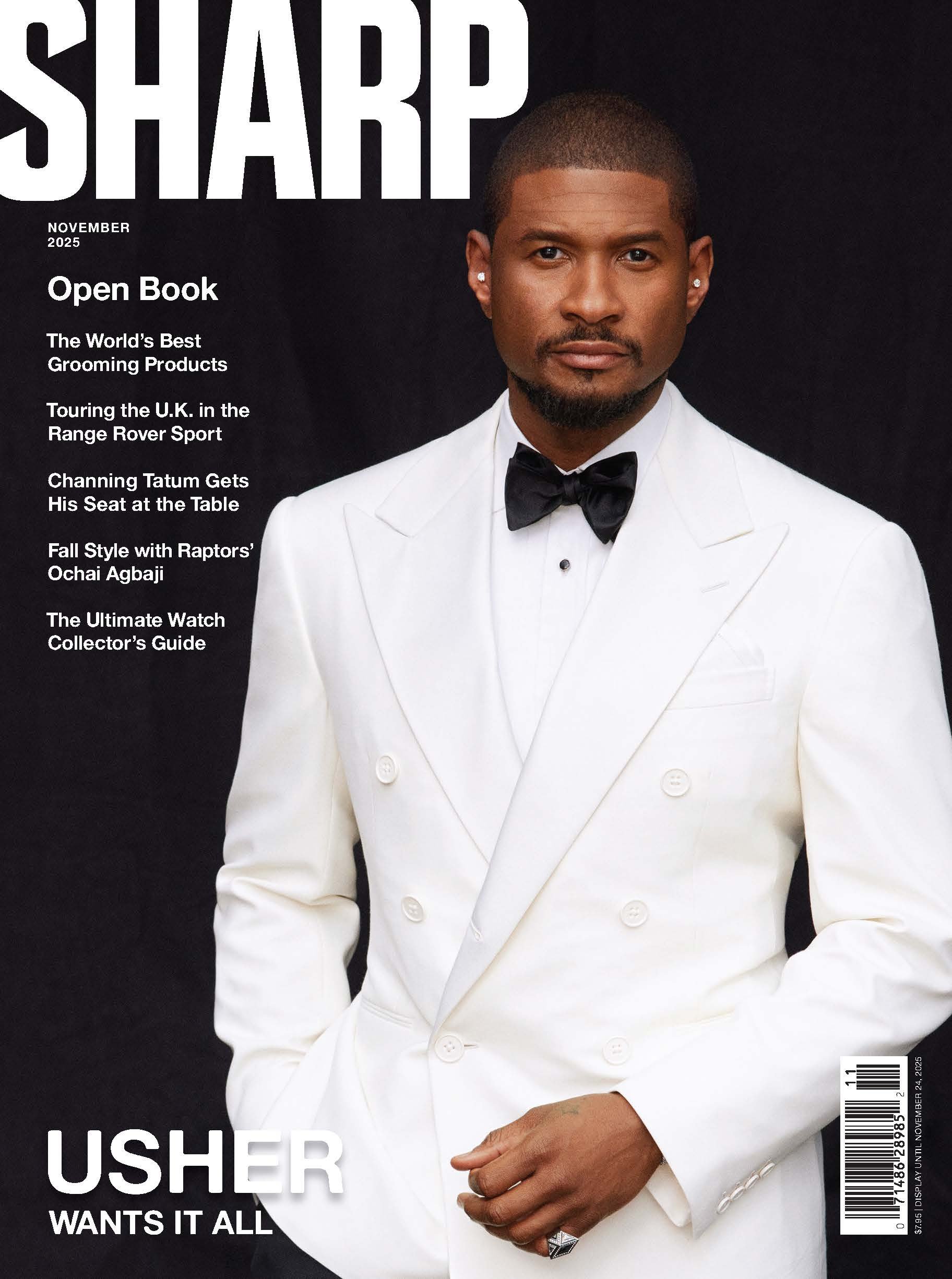 The cover of GQ magazine featuring Usher wearing a white double-breasted suit with a black bow tie, against a black background. The magazine is from November 2025.