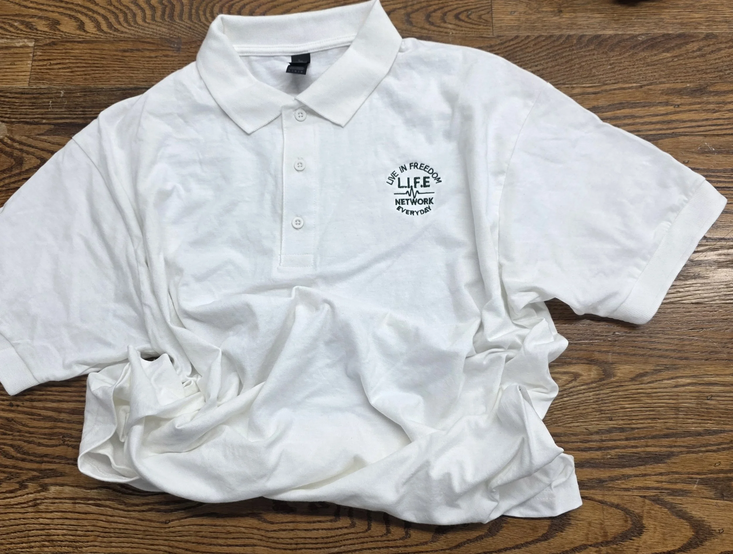White Gildan Polo w - Green Writting.jpg