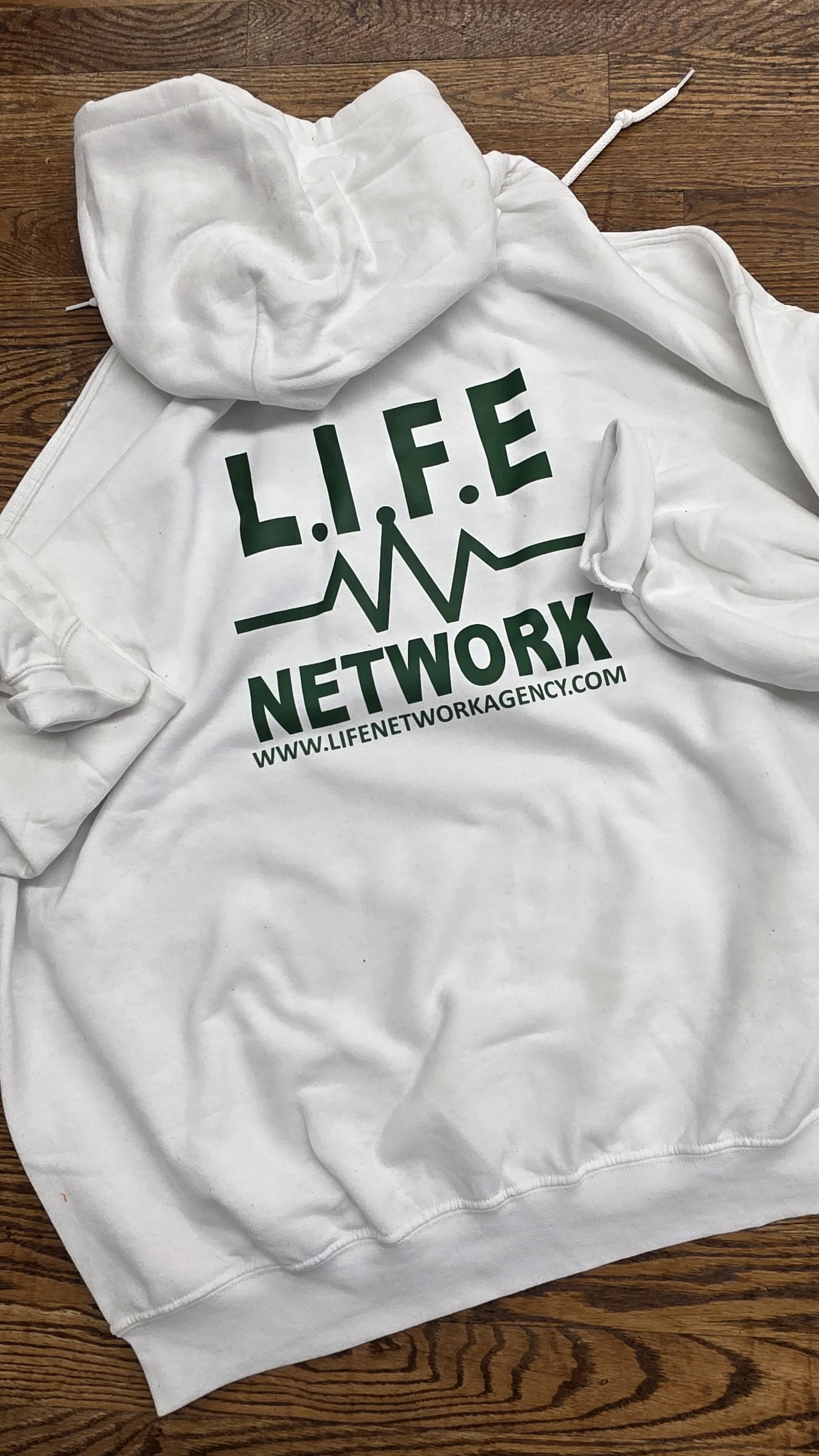 White Hoodie w-green writting.jpg