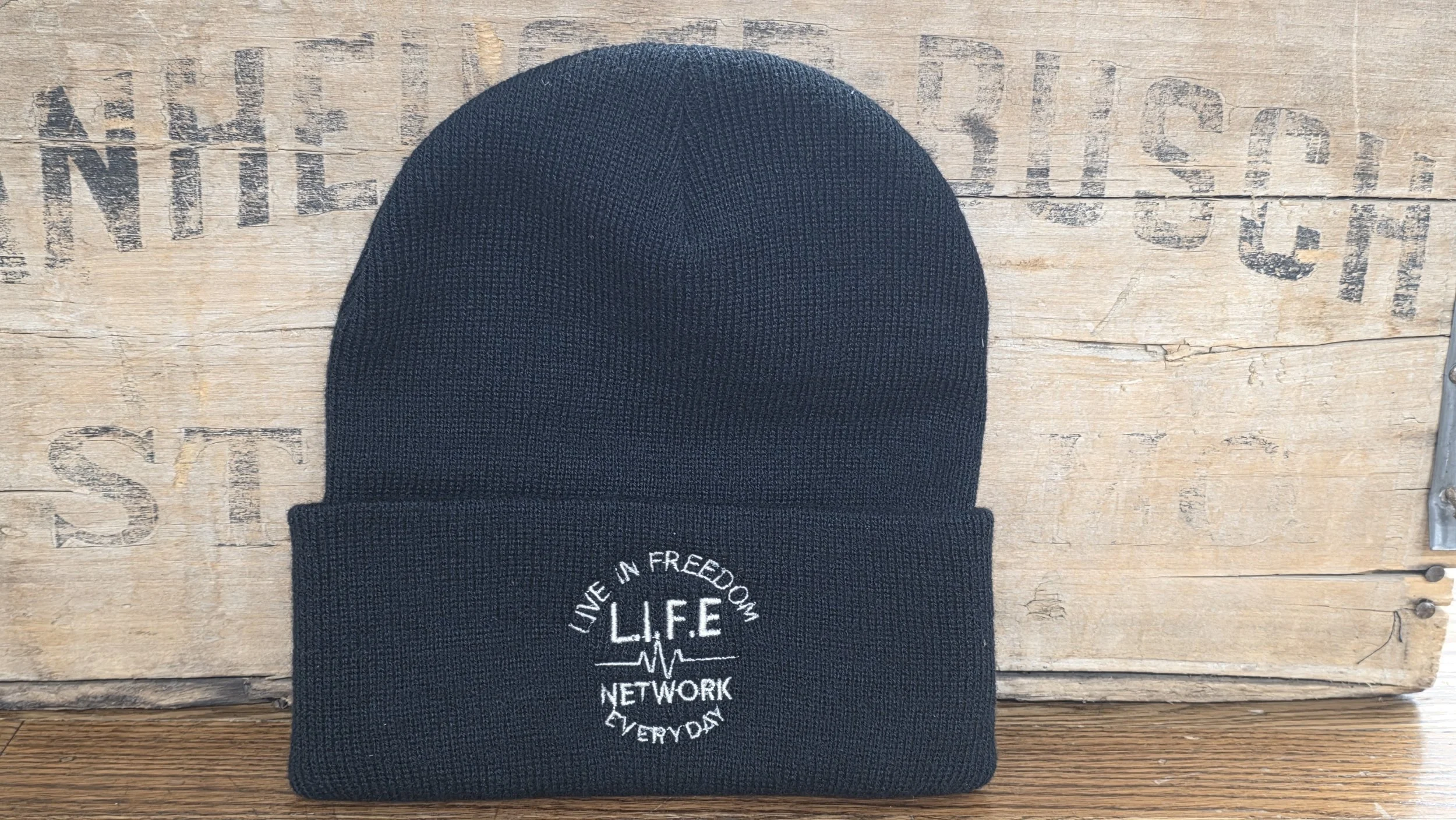 Black Tobaggan w - cream writting.jpg