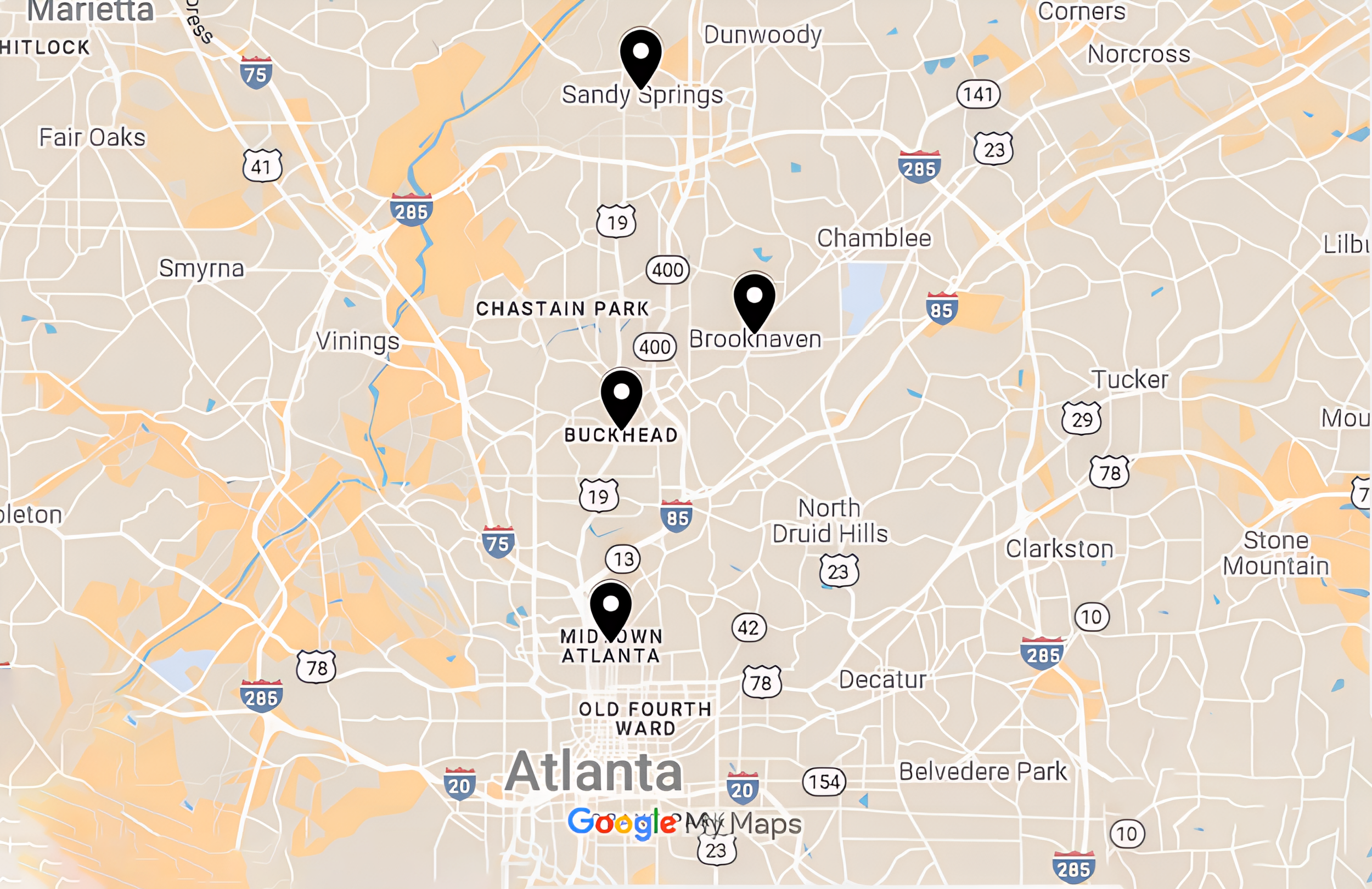 Map of Atlanta, Georgia, showing four locations marked with black pins: Midtown Atlanta, Buckhead, Brookhaven, and Sandy Springs.