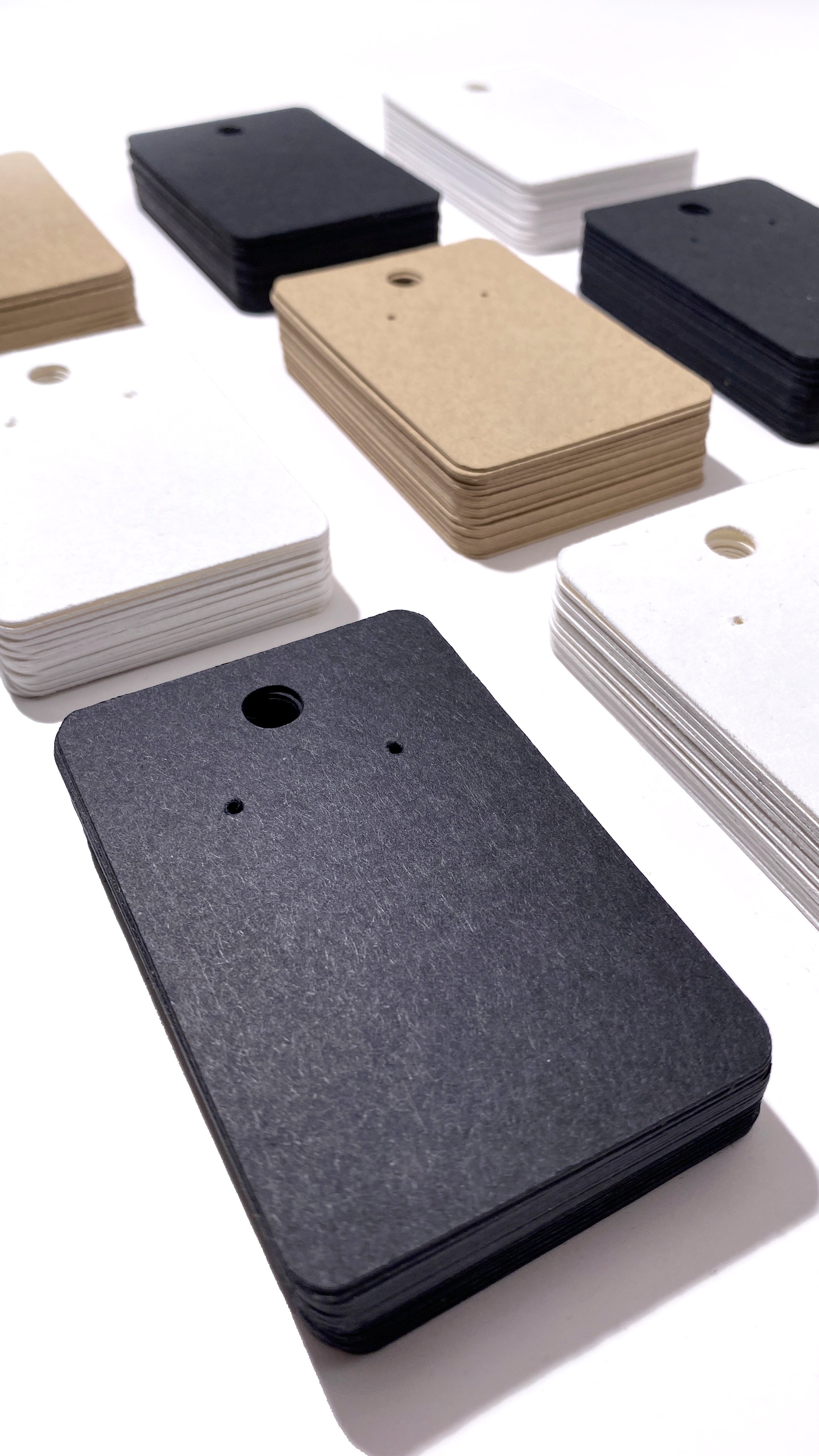 Custom earring display cards showcasing personalized branding, clean jewelry presentation, and professional packaging for small business sellers.