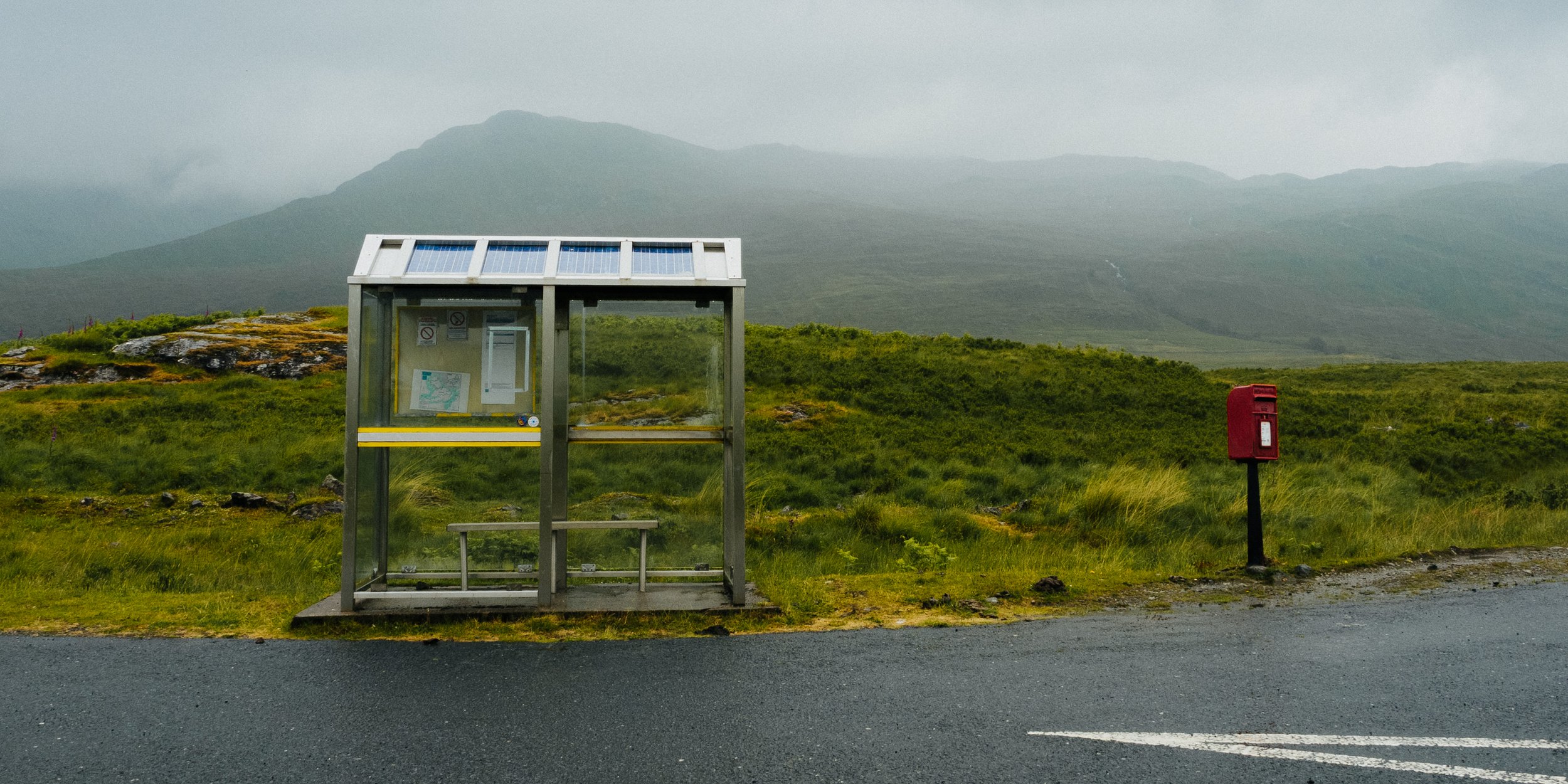 A bus stop next to a postbox on the Isle of Mull, Scotland.