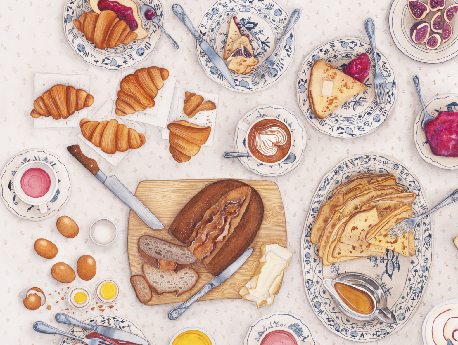 Overhead view of a breakfast table with croissants, slices of bread, pancakes, pancakes with syrup, cakes, butter, eggs, and coffee on blue and white patterned plates and dishes on a beige tablecloth. Czech typical porcelain plates and cups.