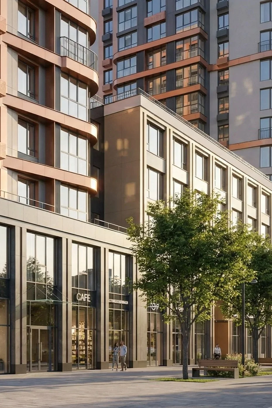 Moderne Hochhäuser mit großen Fenstern, einige mit Balkonen, im Vordergrund ein Baum und ein Café mit großen Glasfenstern, Menschen gehen und sitzen im Außenbereich.