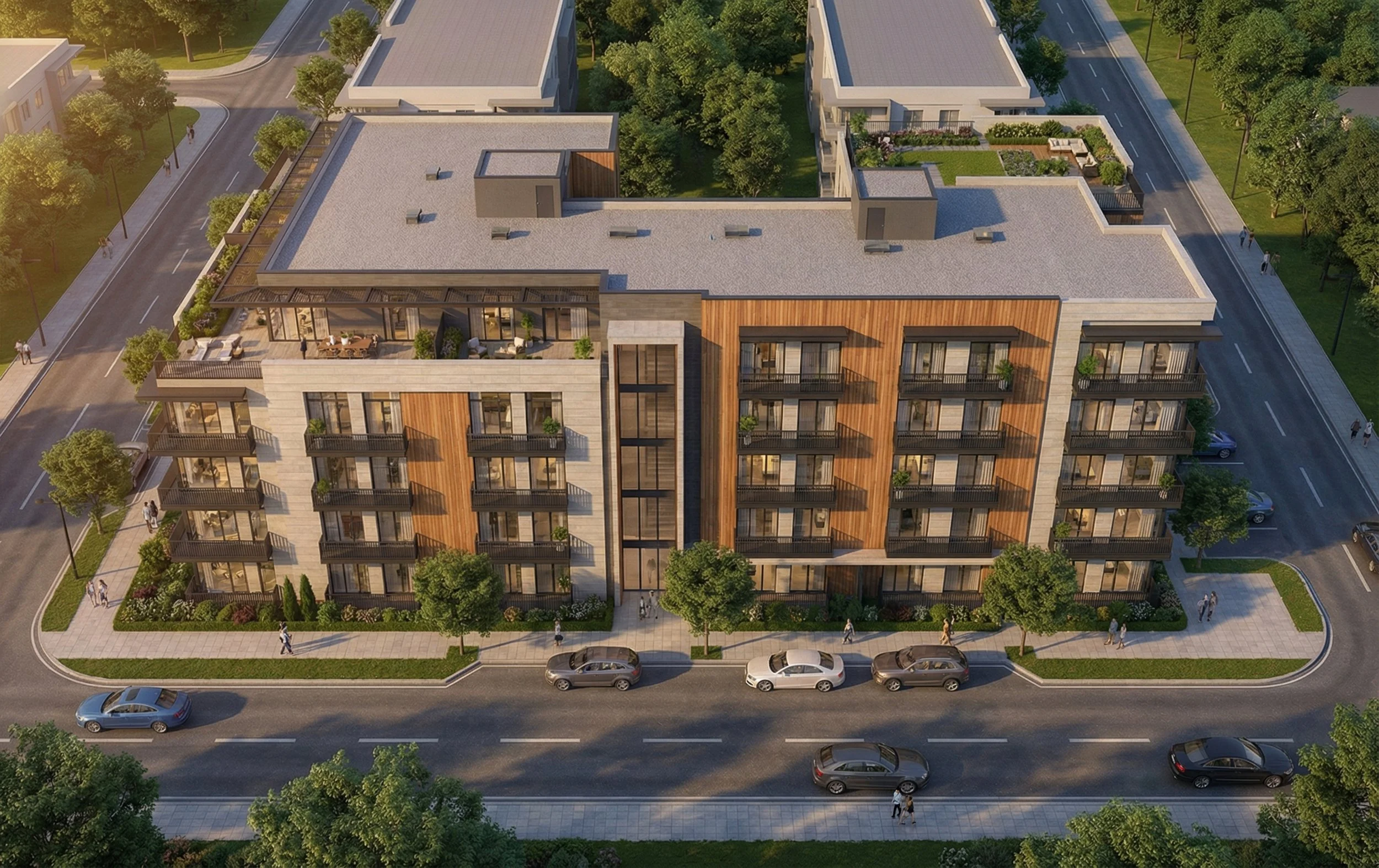 Modernes Mehrfamilienhaus mit Balkonen, umgeben von Bäumen und einer Straße mit parkenden Autos.