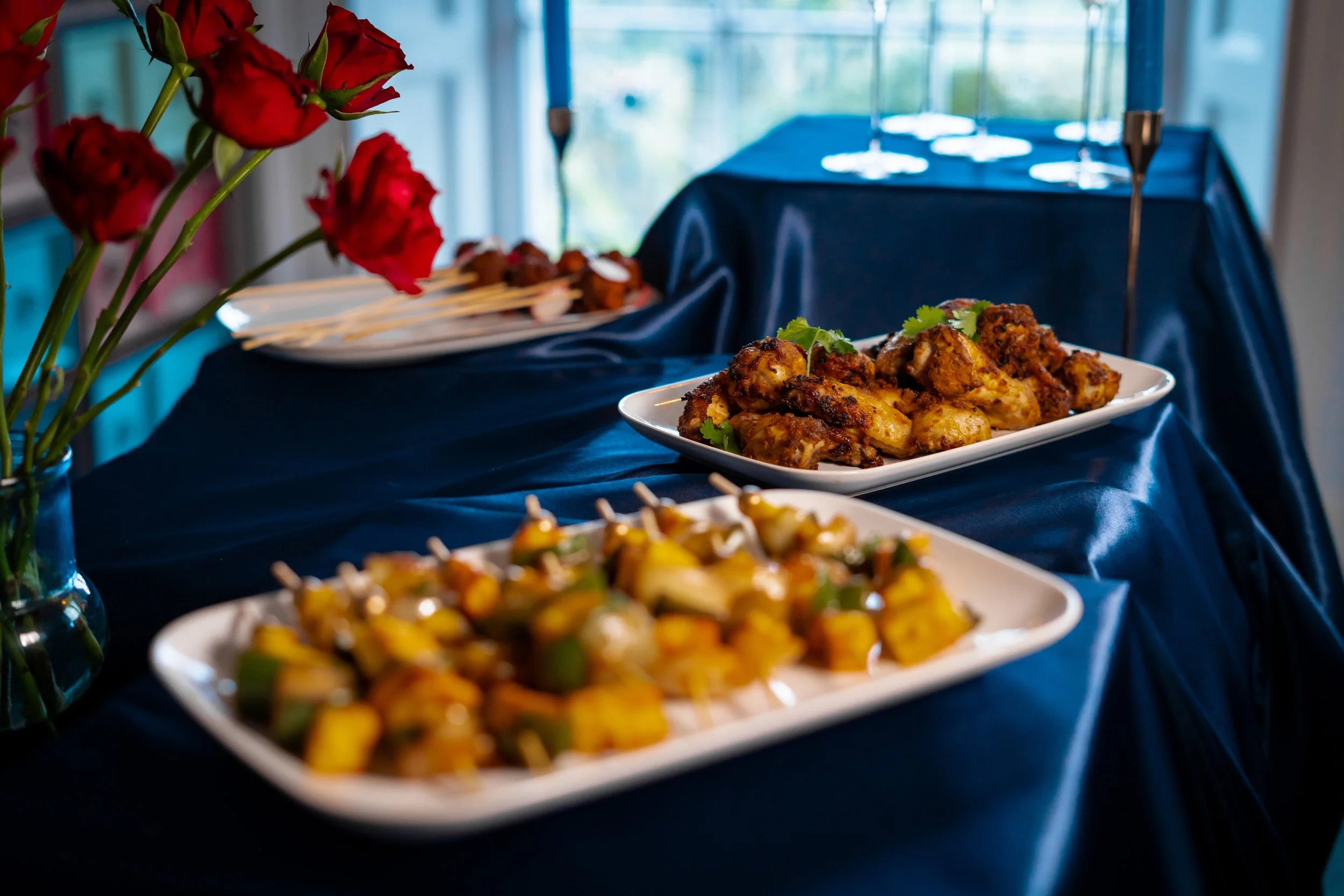landscape of roses and food platters