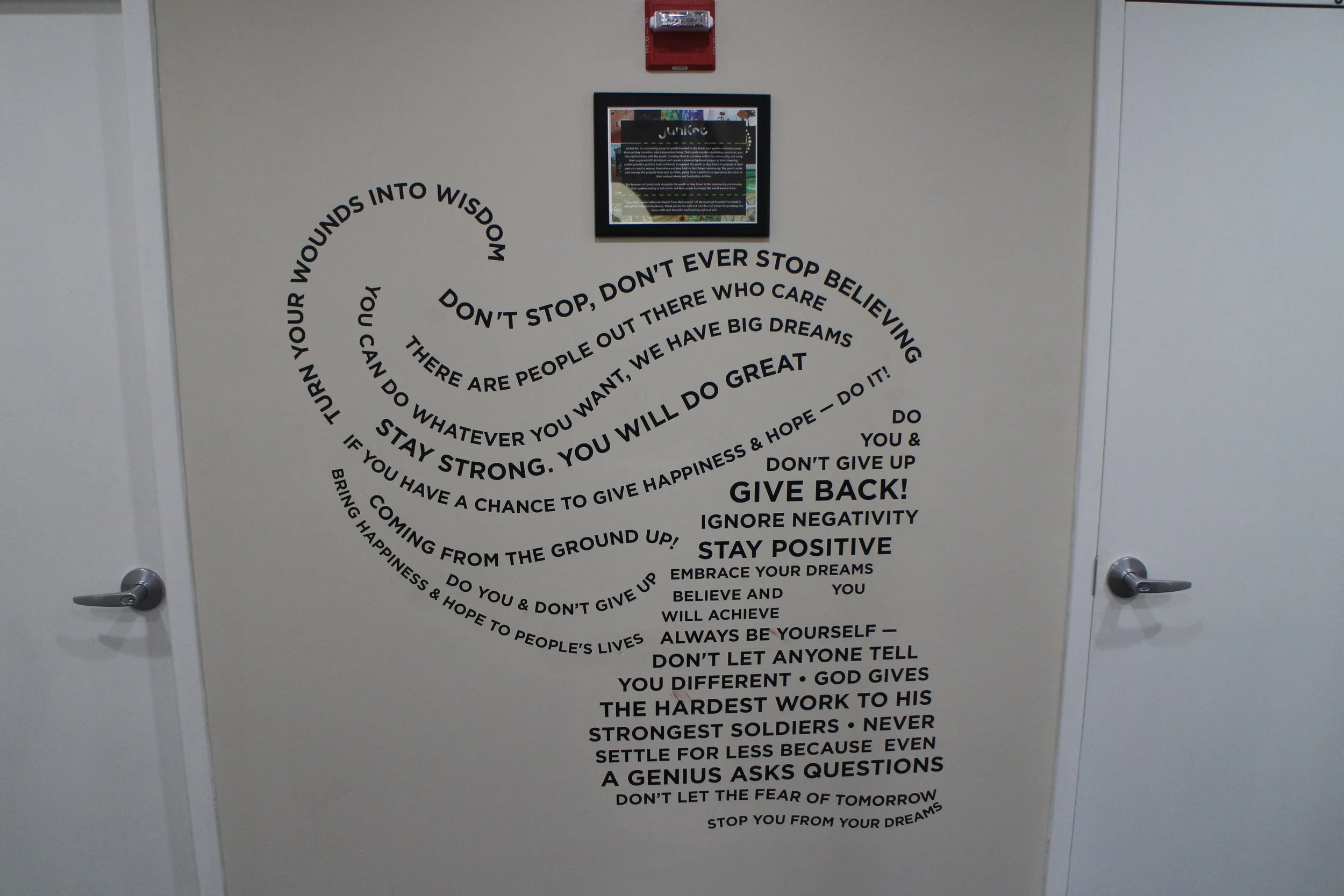 Inspirational motivational quote wall decoration in a shape of a heart with various encouraging phrases and messages.