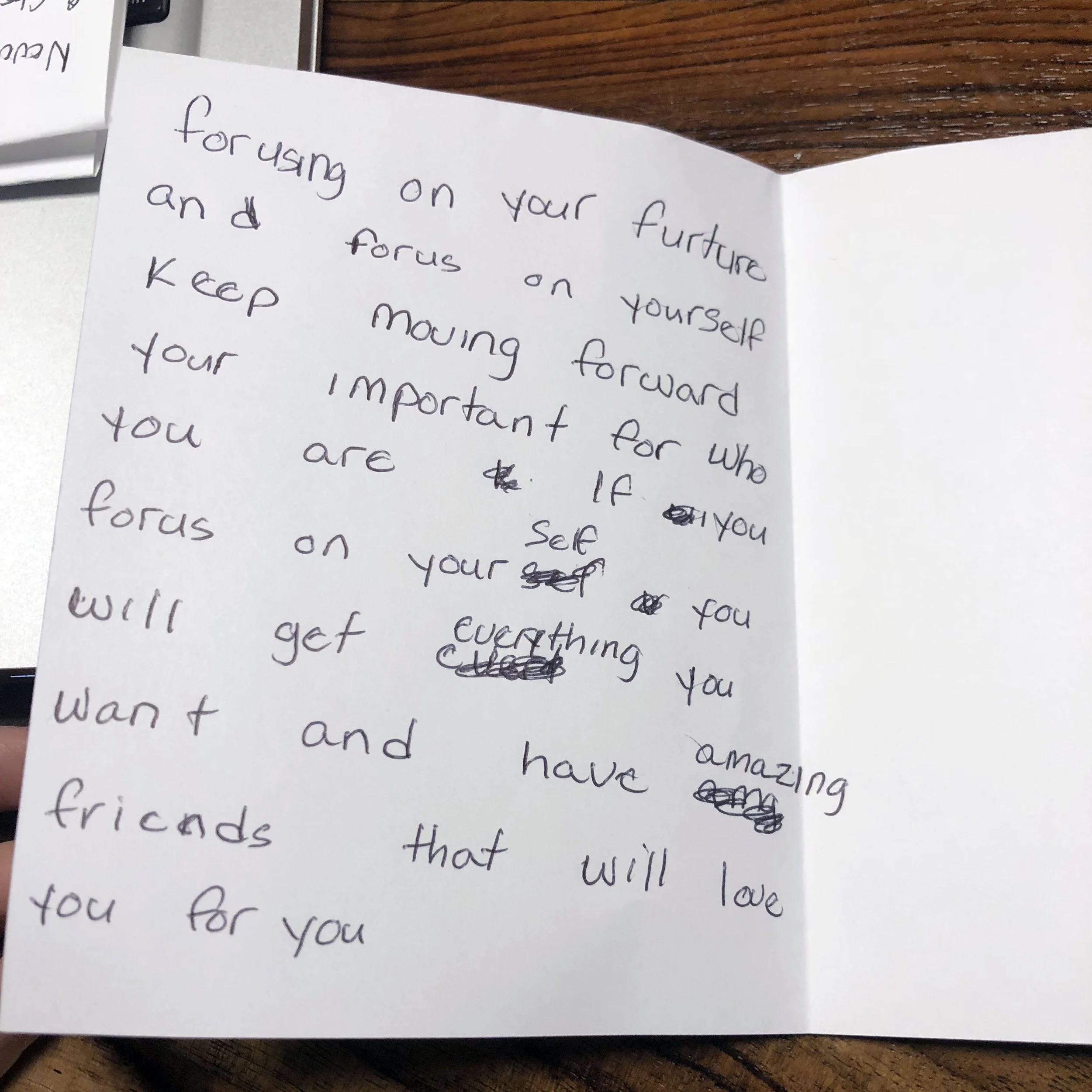 Handwritten inspirational message on white paper page.