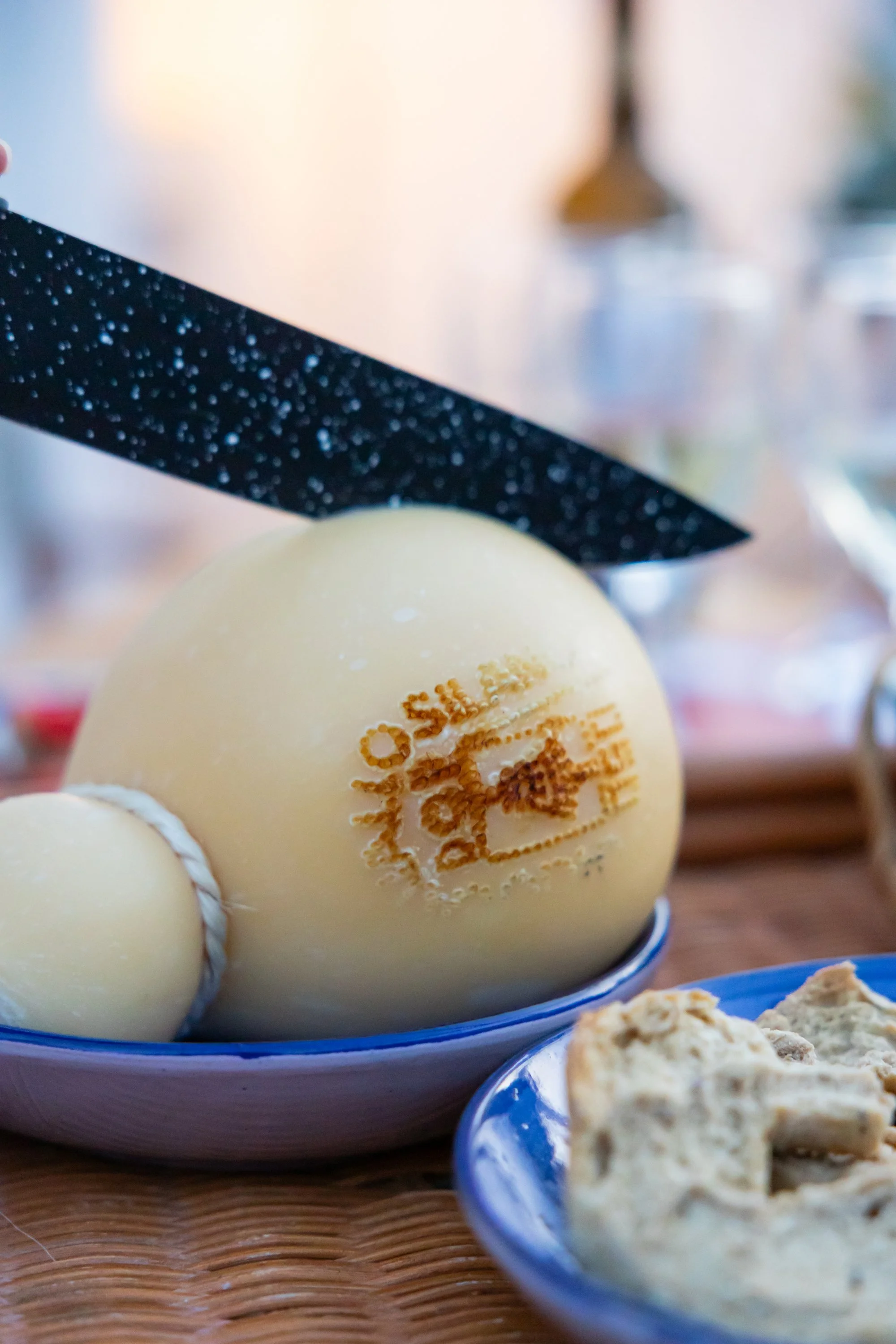 Cheese prepared for an aperitivo or shared meal in the outdoor kitchen at Palazzo Dolce Vita.