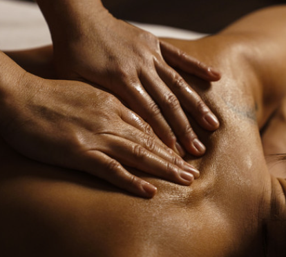 Person receiving a massage on their back