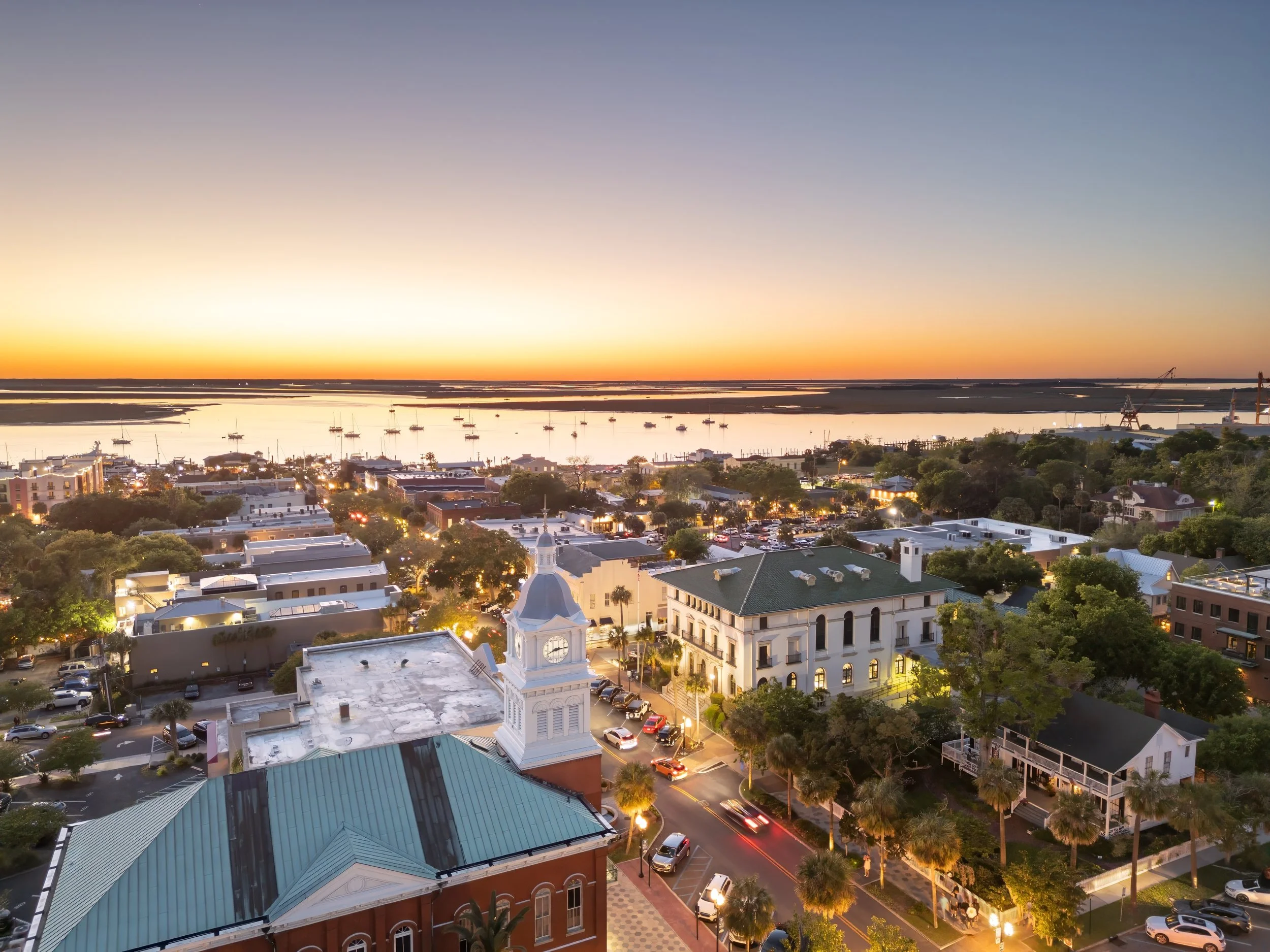 Evening aerial of Fernandina Beach historic district near Amelia Island waterfront.