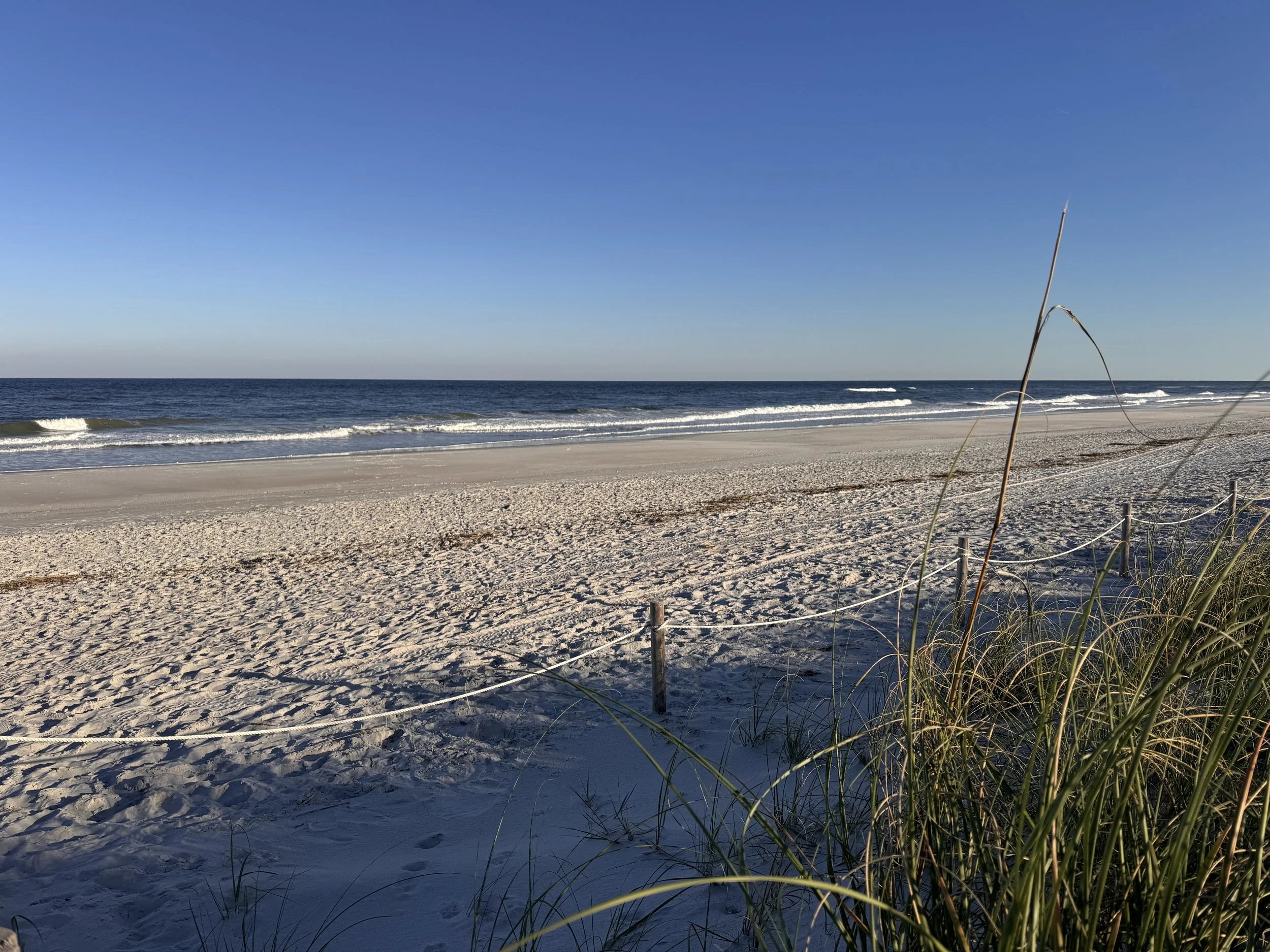 Atlantic Beach beach access near oceanfront homes at sunset.