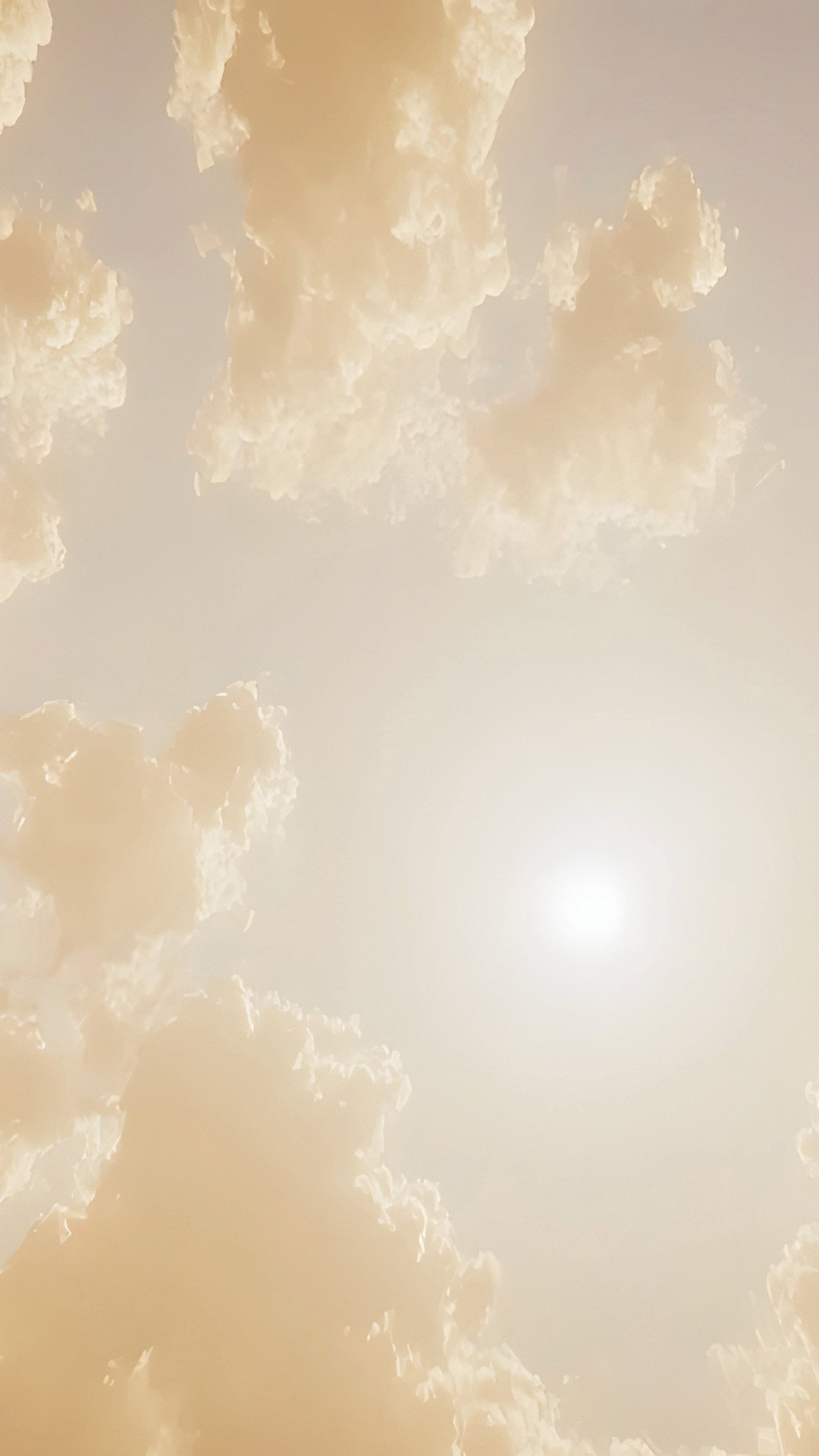 Sky with scattered clouds and bright sunlight.