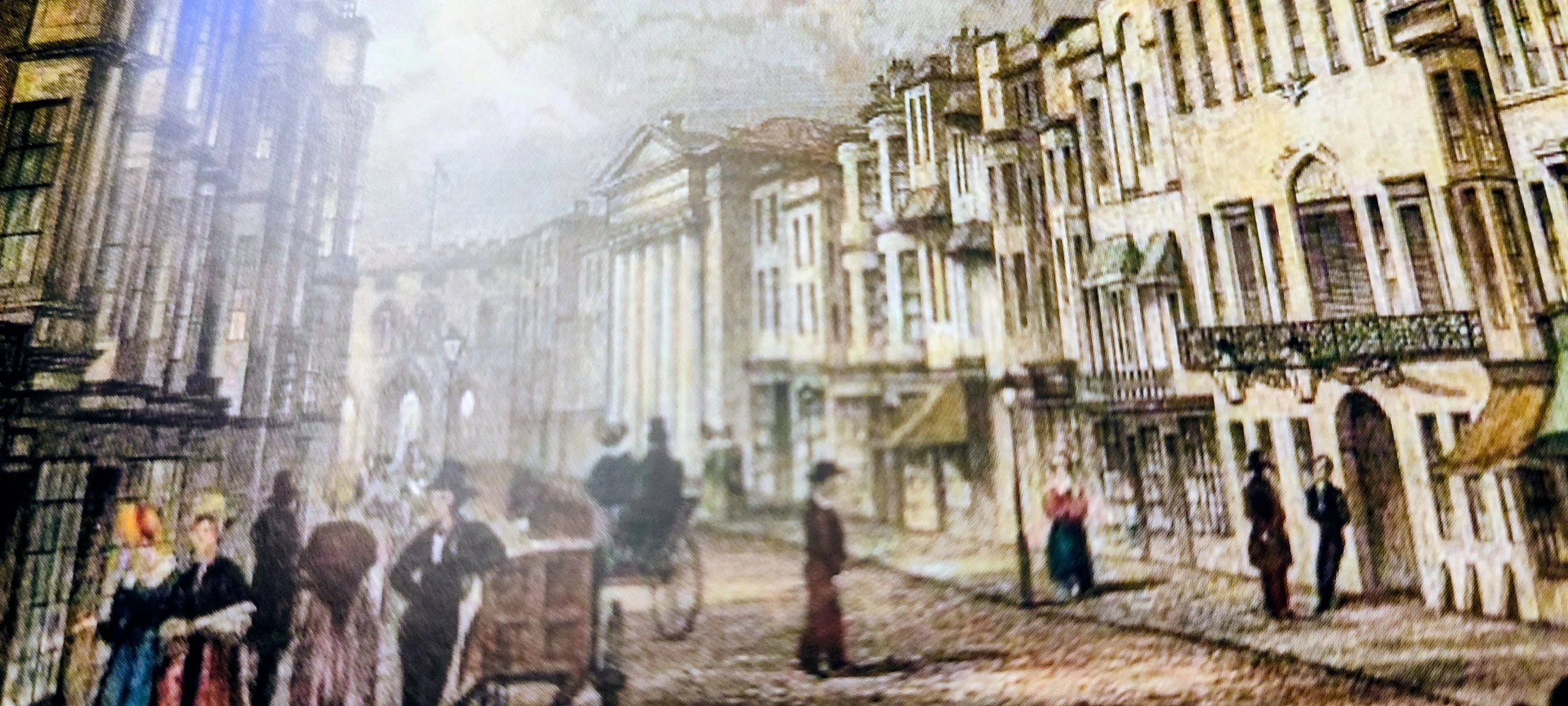 A painting of a street scene with Victorian-style buildings and people dressed in 19th-century clothing walking and socializing.