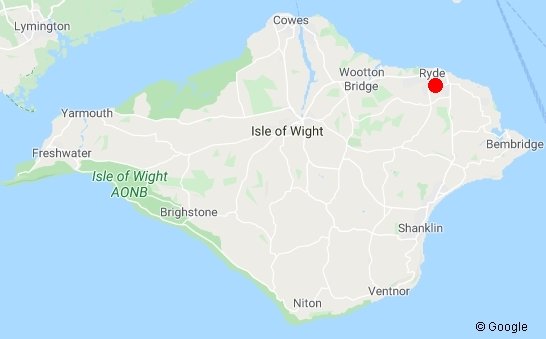 Map of the Isle of Wight with major towns labeled and a red dot marking Ryde.