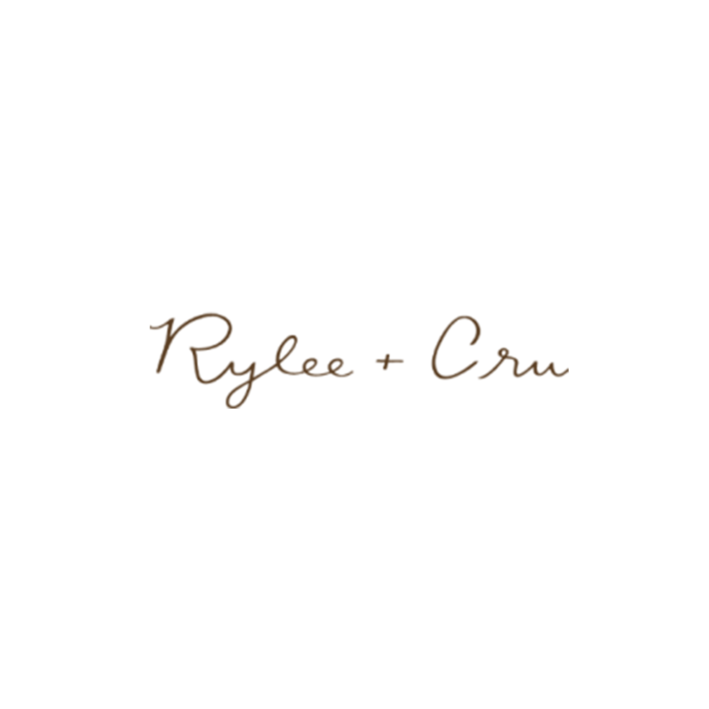 Black mug with gold text reading 'Rylee + Cru'.