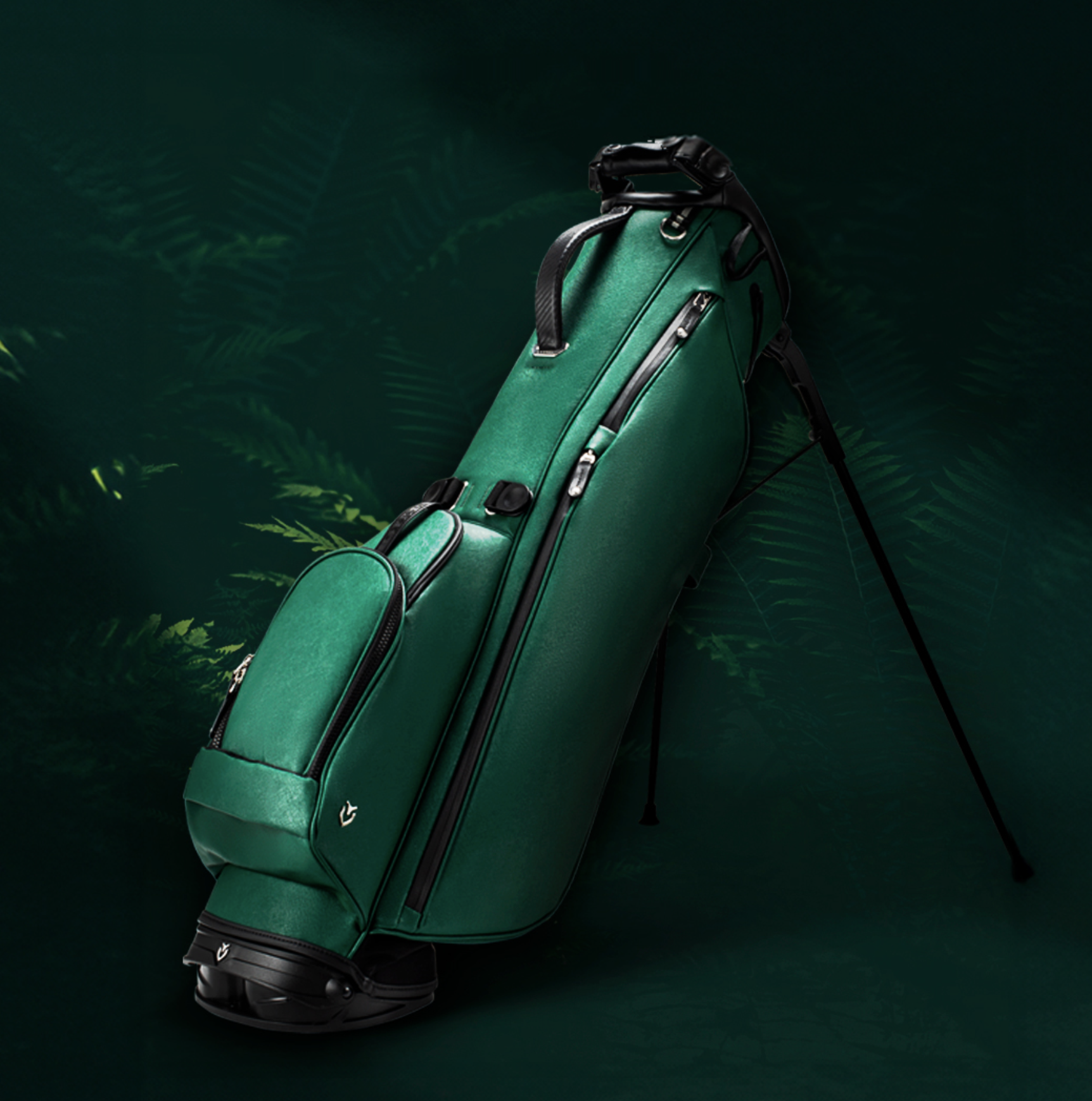 Green golf bag with clubs, standing on a dark background with leafy patterns.