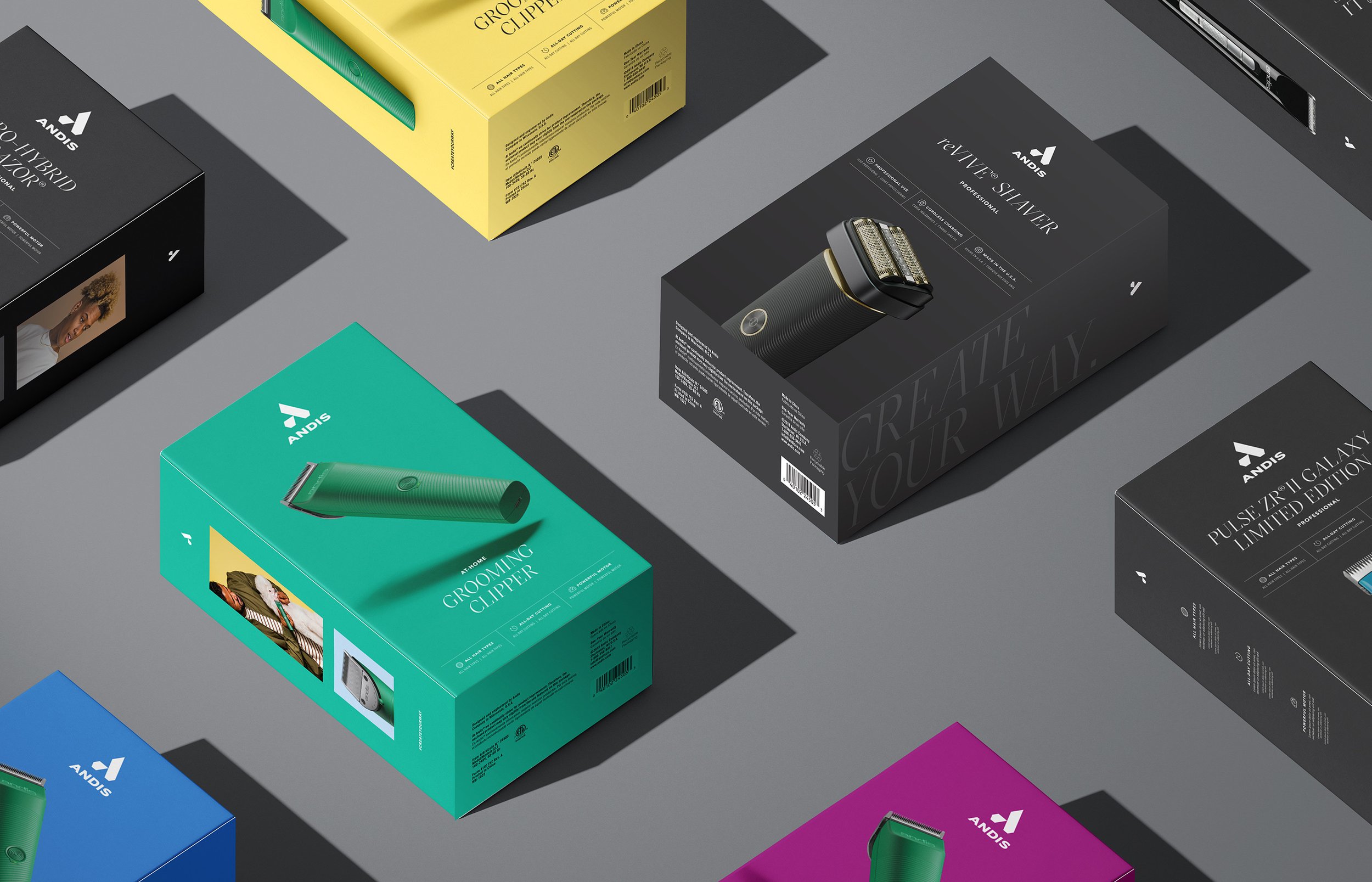 Various boxed grooming products including an electric shaver, razor, and trimmer, arranged on a gray surface with shadows.