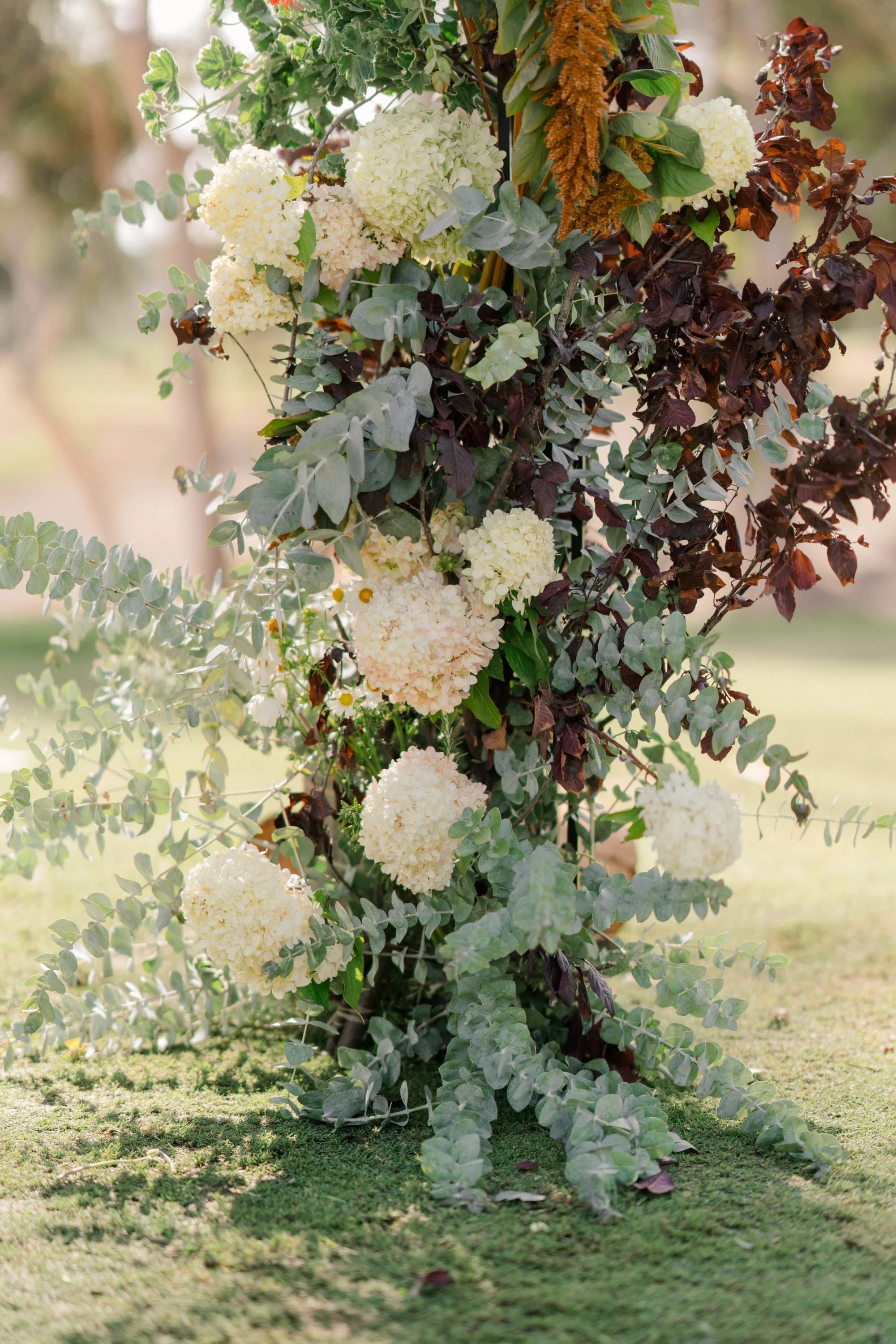 modern_floral_wedding_arch_with_greenery_nyc.jpg
