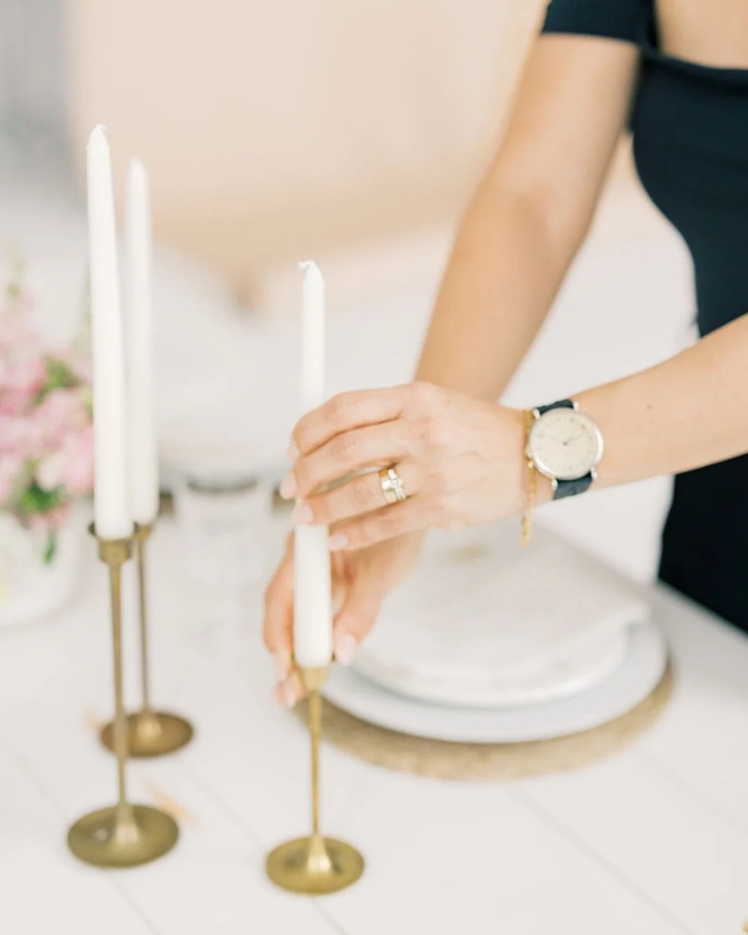 It may look like I'm simply setting a table.

But this moment is backed by months of planning.

Before your wedding day arrives, your planner has already confirmed vendor timelines, finalized the floor plan, coordinated deliveries, reviewed logistics