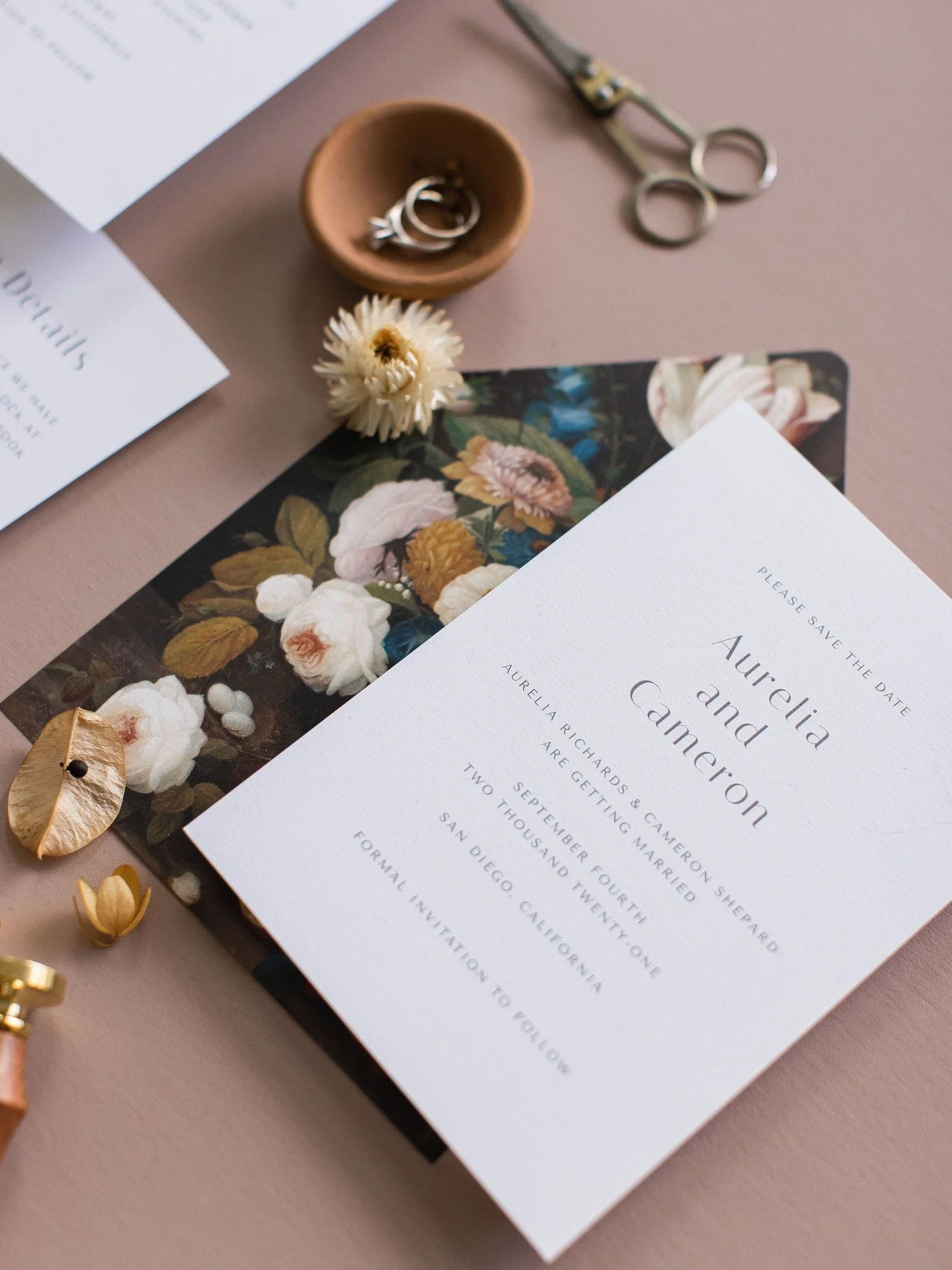 There comes a moment in wedding planning when everything starts to feel real.

For a lot of couples, it's not when they book the venue or choose their florist.

It's when they send their save-the-dates.

Until then, your wedding mostly exists in conv