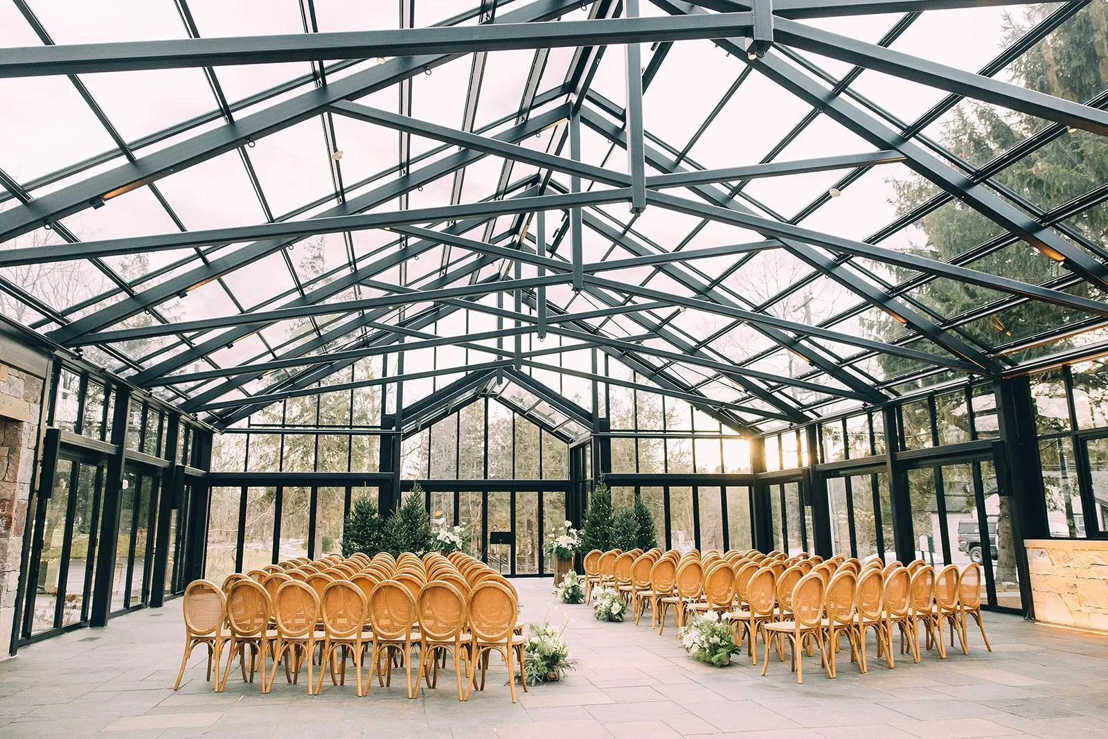 Hudson Valley Cedar Lakes Estate Glasshouse showing a  wedding venue hosting a weekend wedding celebration