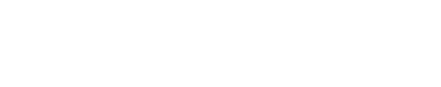 A panoramic cityscape featuring tall buildings under a partly cloudy sky.