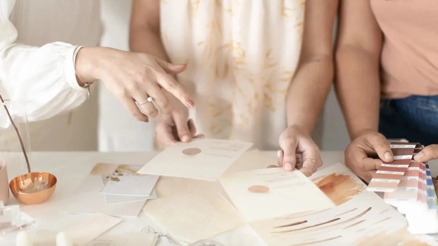 Couple reviewing wedding design details during New York wedding planning