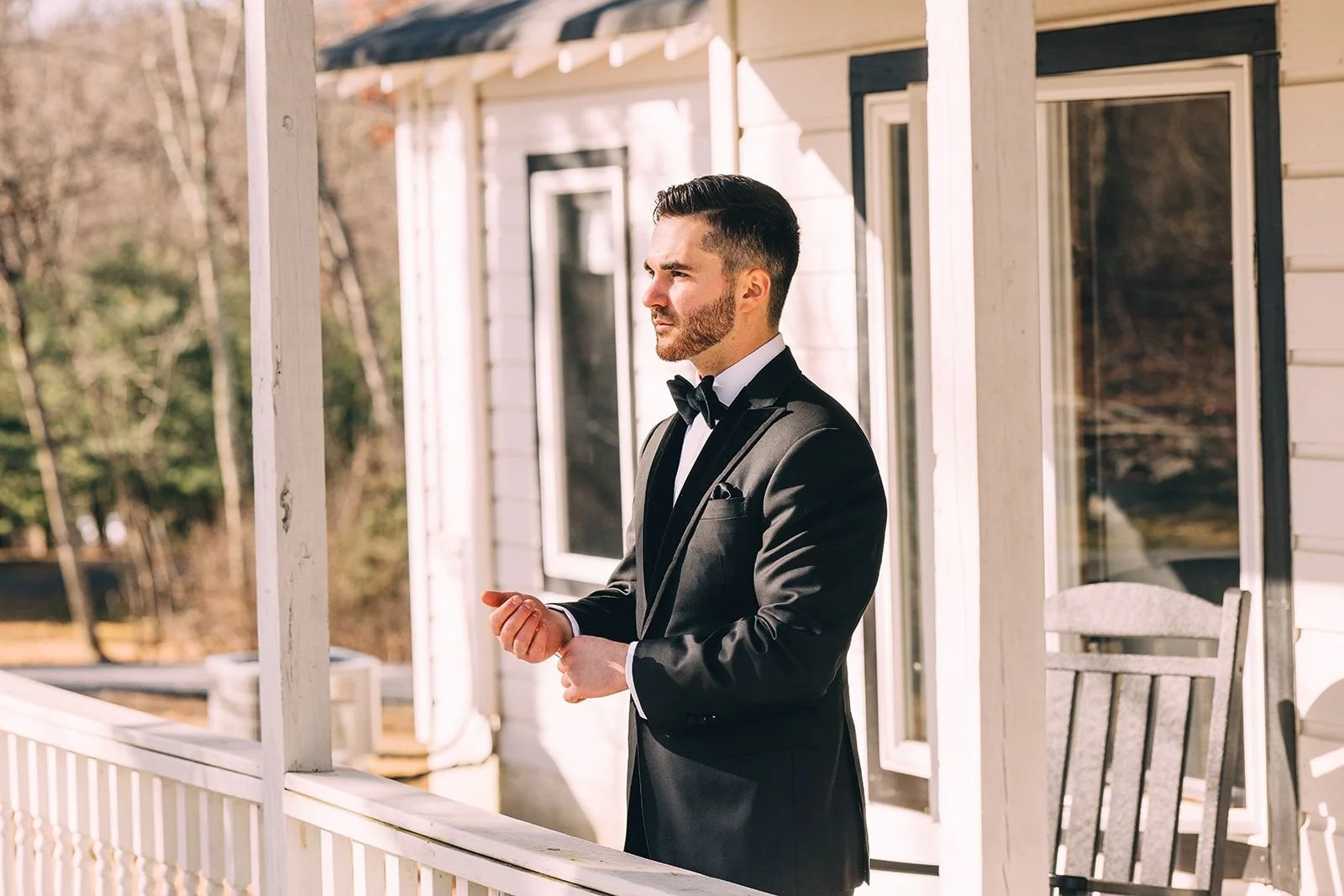 cedar-lakes-estate-wedding-groom-portrait-barn-porch.jpg.jpg