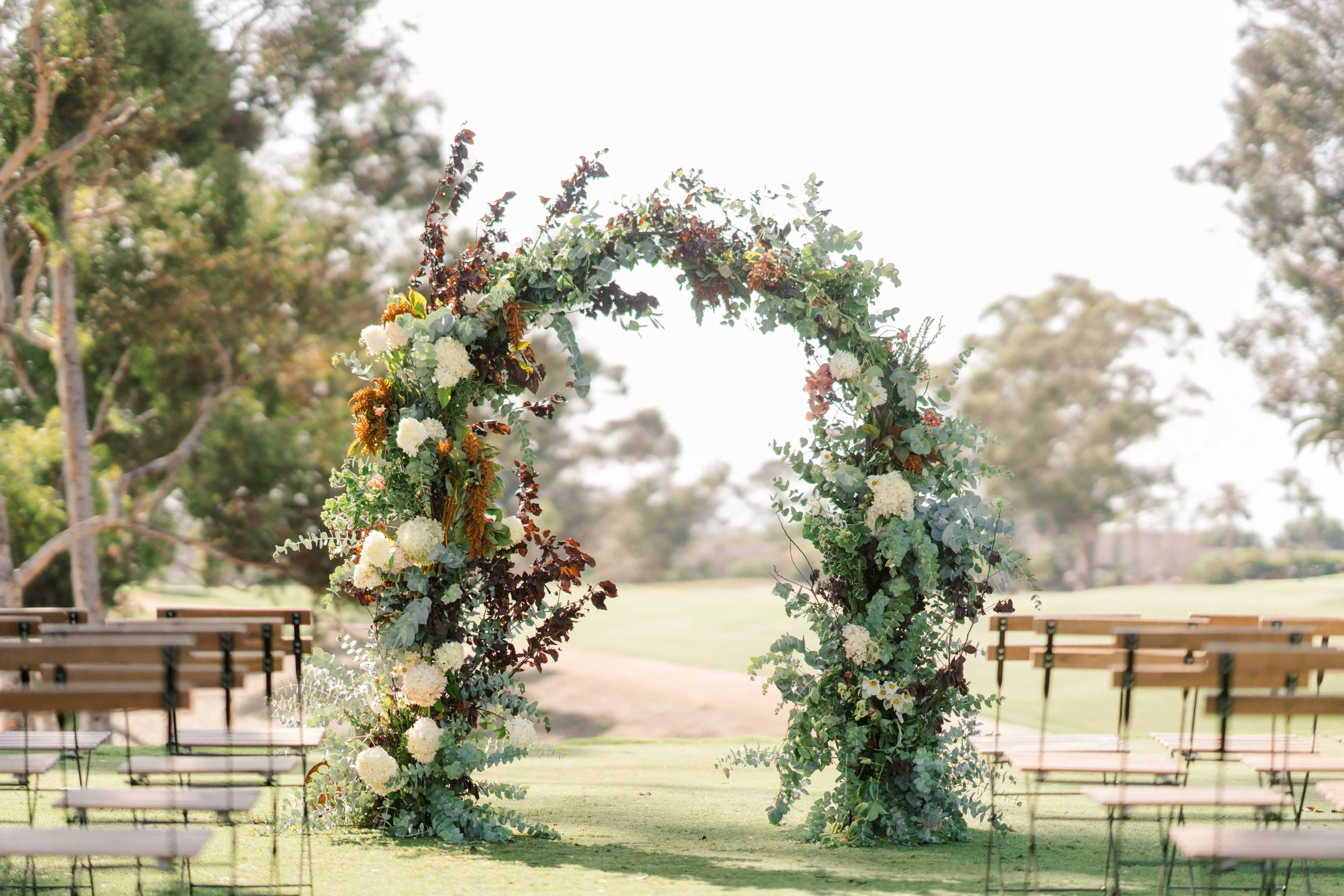 What to Know Before Choosing a Floral Arch as Your Ceremony Decor