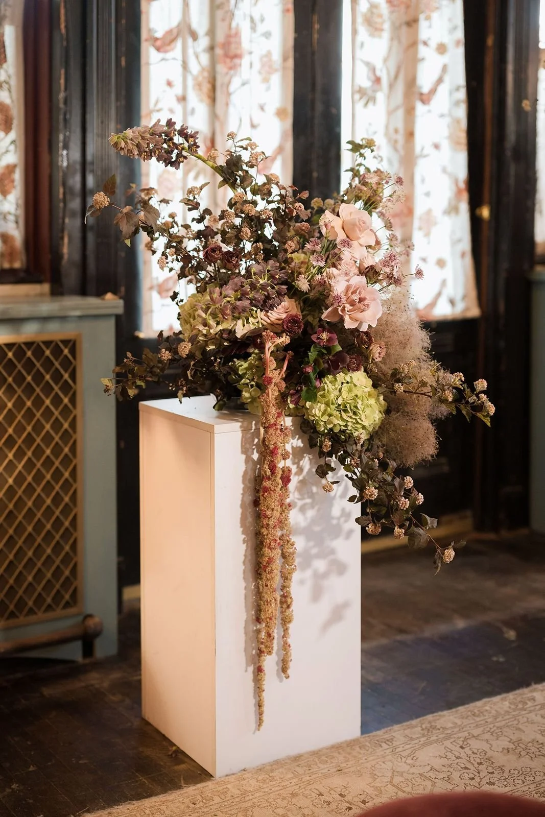 Romantic floral centerpiece for intimate wedding reception design
