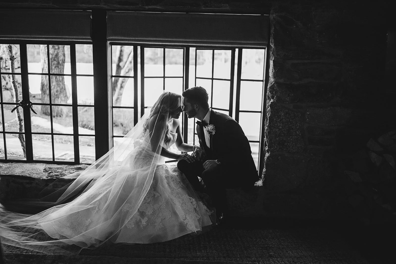 Couple sharing a quiet moment during their wedding day at Cedar Lakes Estate.