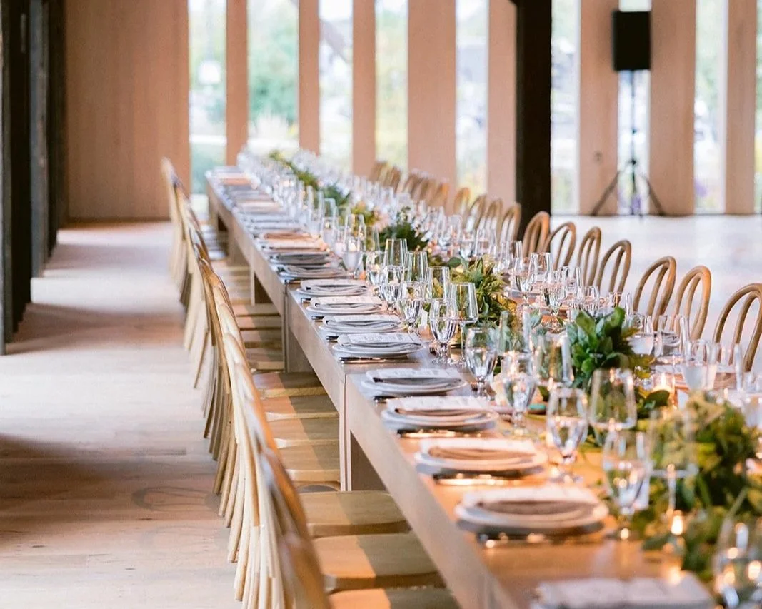 Long table wedding reception setup showing guest seating and layout