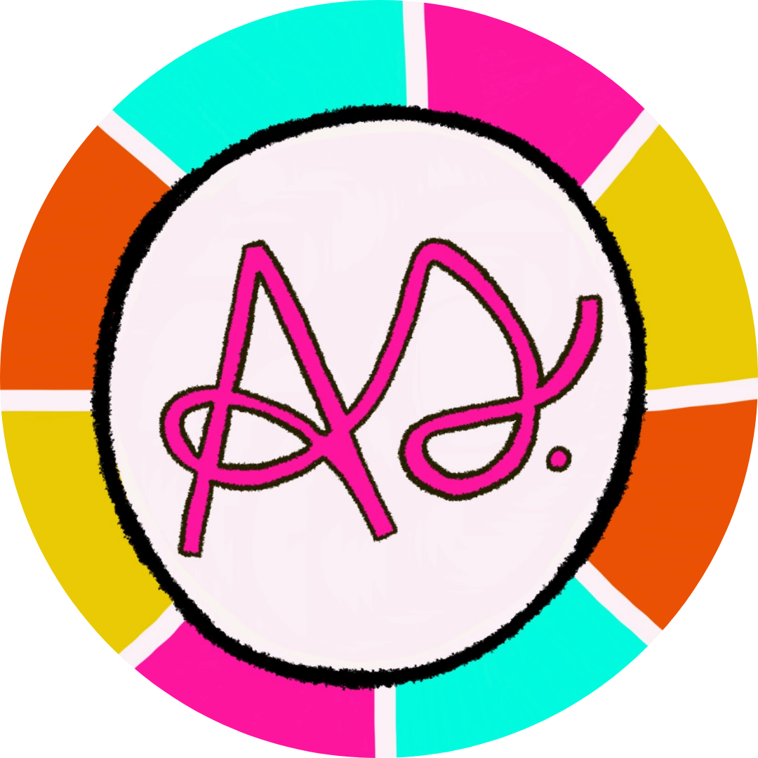Colorful wheel with a pink scribbled signature or logo in the center.