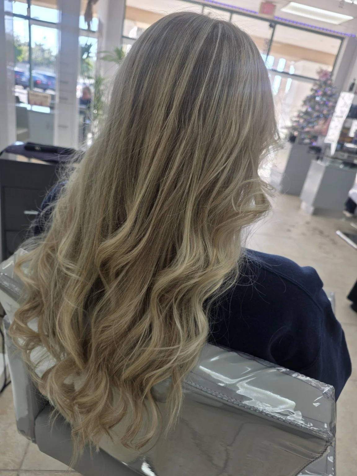 Long blonde waves at Luxury Hair Studio II