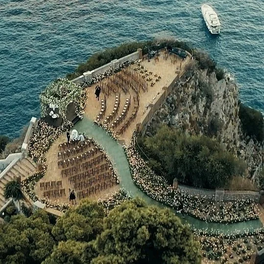 wedding ceremony venue on top of a hill or mountain cliff overlooking the ocean