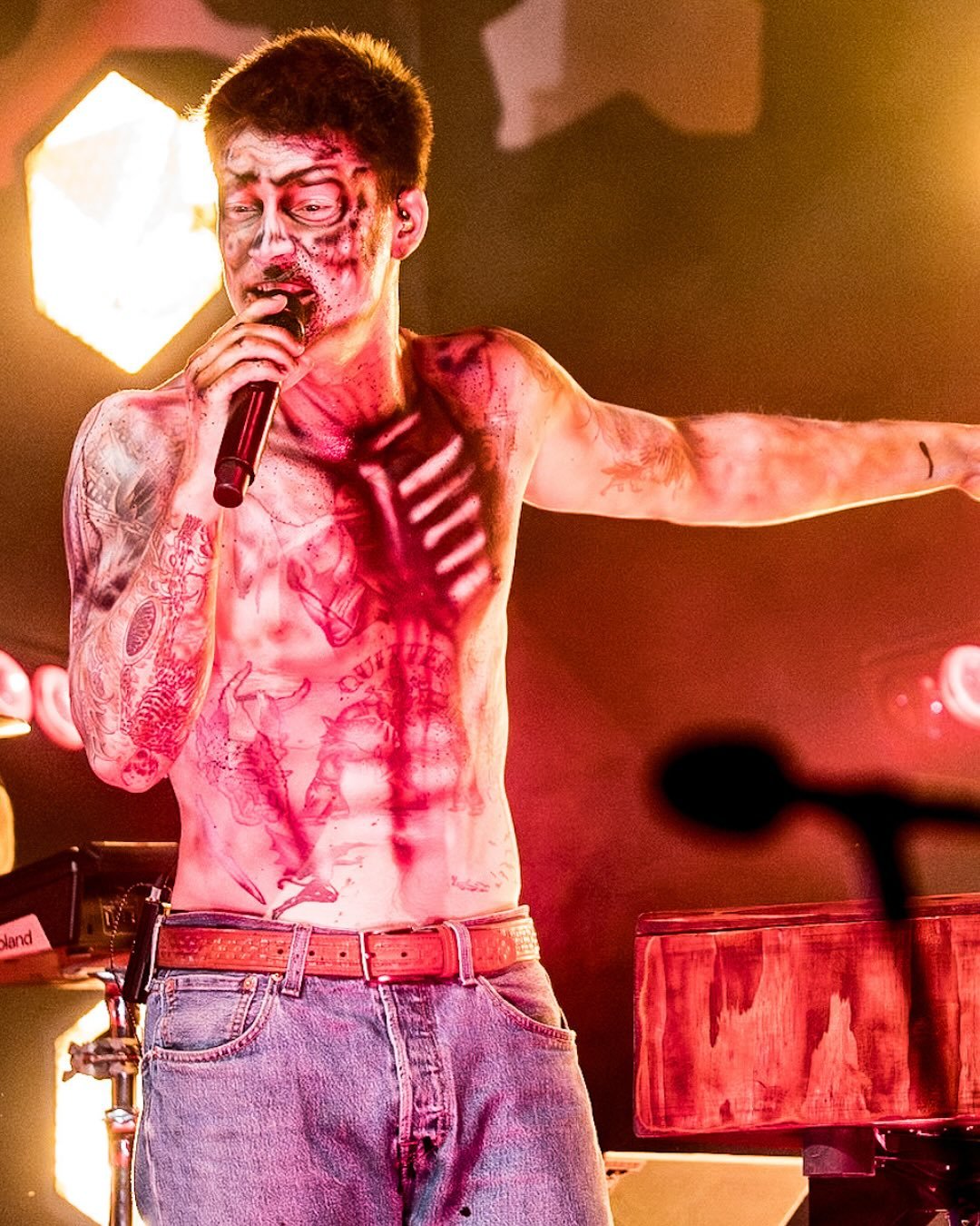 The energy of a frontman.

For Cameron Whitcomb&rsquo;s Halloween show at the Roxian, I designed his signature zombie look &mdash; bold, detailed, and built for the stage. Every highlight and bite mark was crafted to move with the performance, not ag