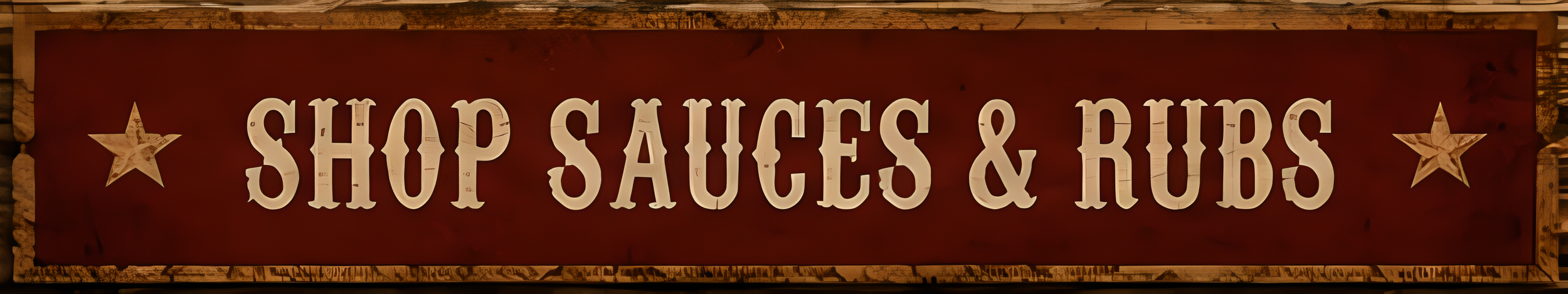 Signboard reading 'Shop Sauces & Rubs' with star decorations on a rustic wooden background.