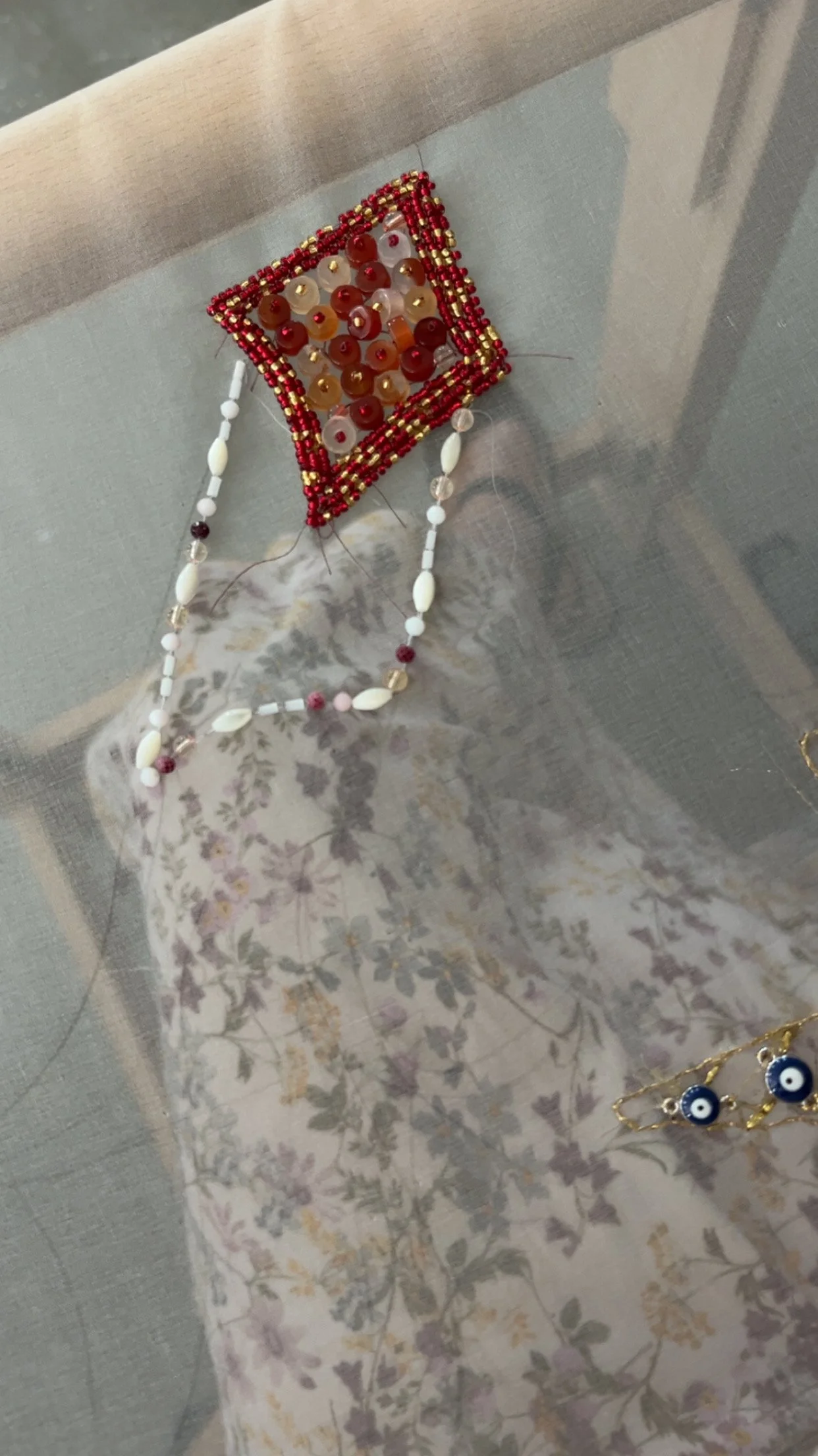 Beaded squid done with tambour hook and beading needle
