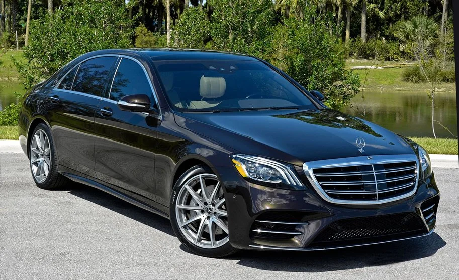 Ghost Sedan's Mercedes s560 parked lakeside