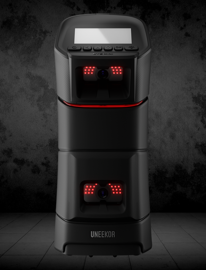 A floor based golf launch monitor with a display screen and multiple cameras.