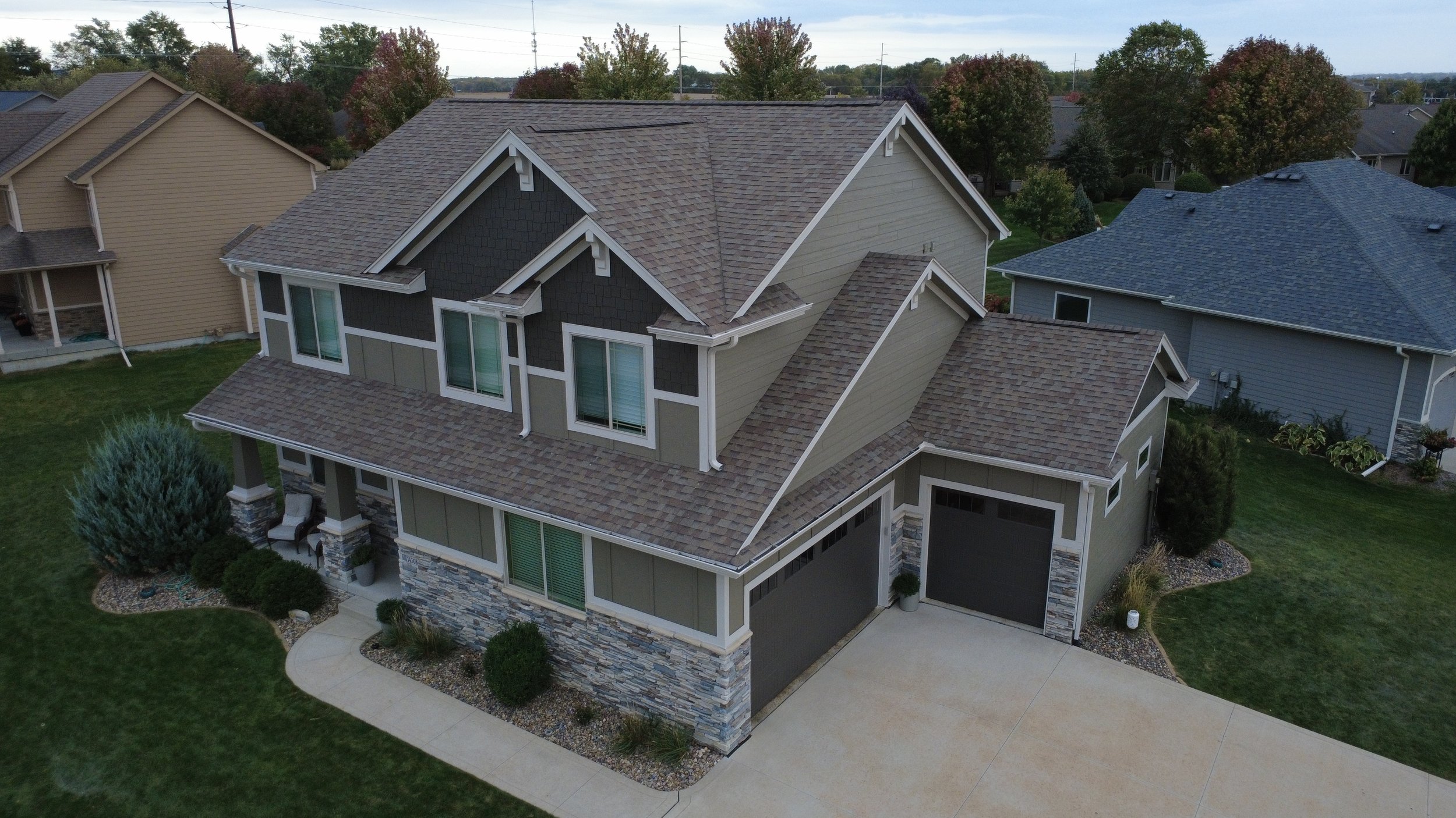 Exterior house with freshly painted siding showing a clean, professional exterior painting finish