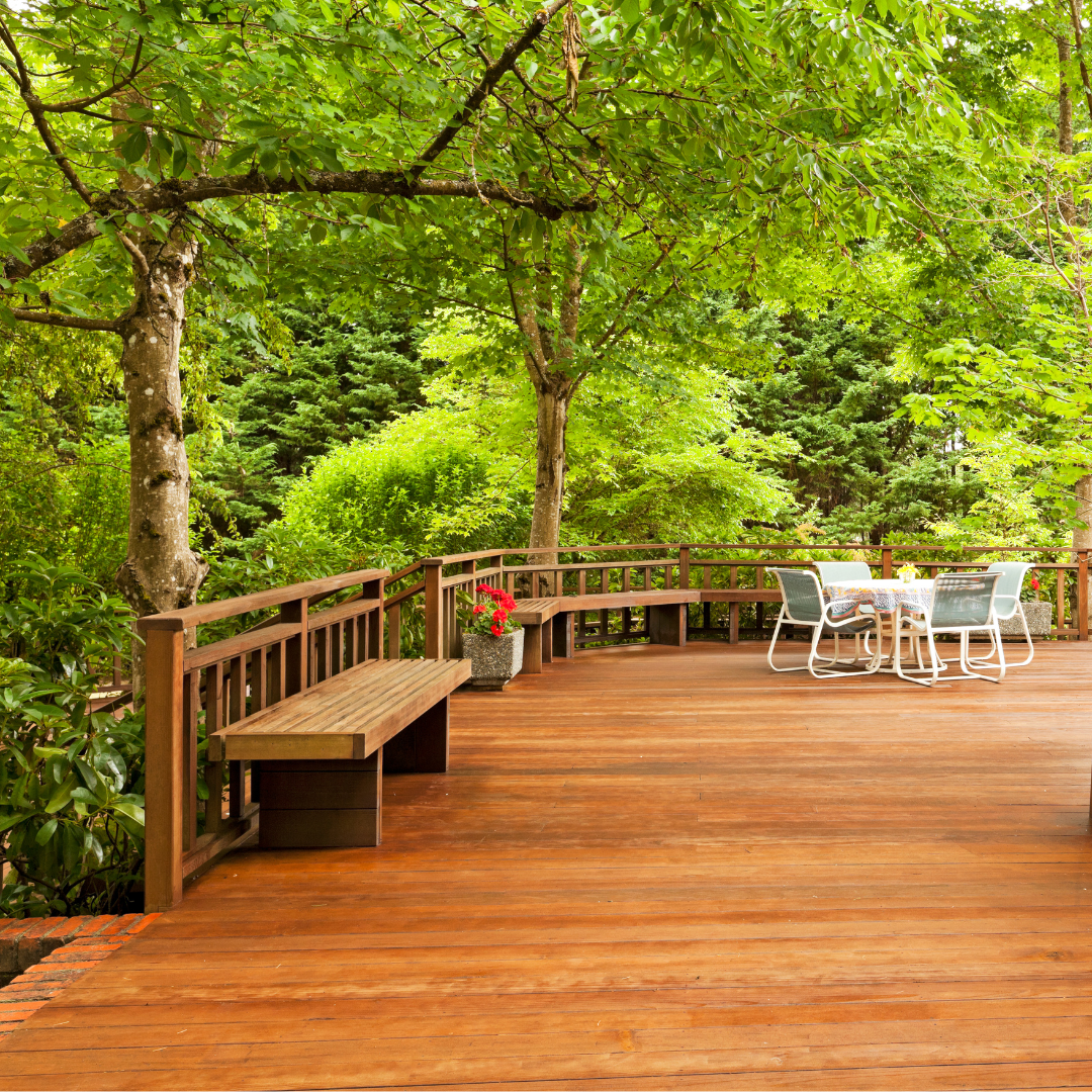 Wood deck and fence with professional staining for enhanced durability and color.