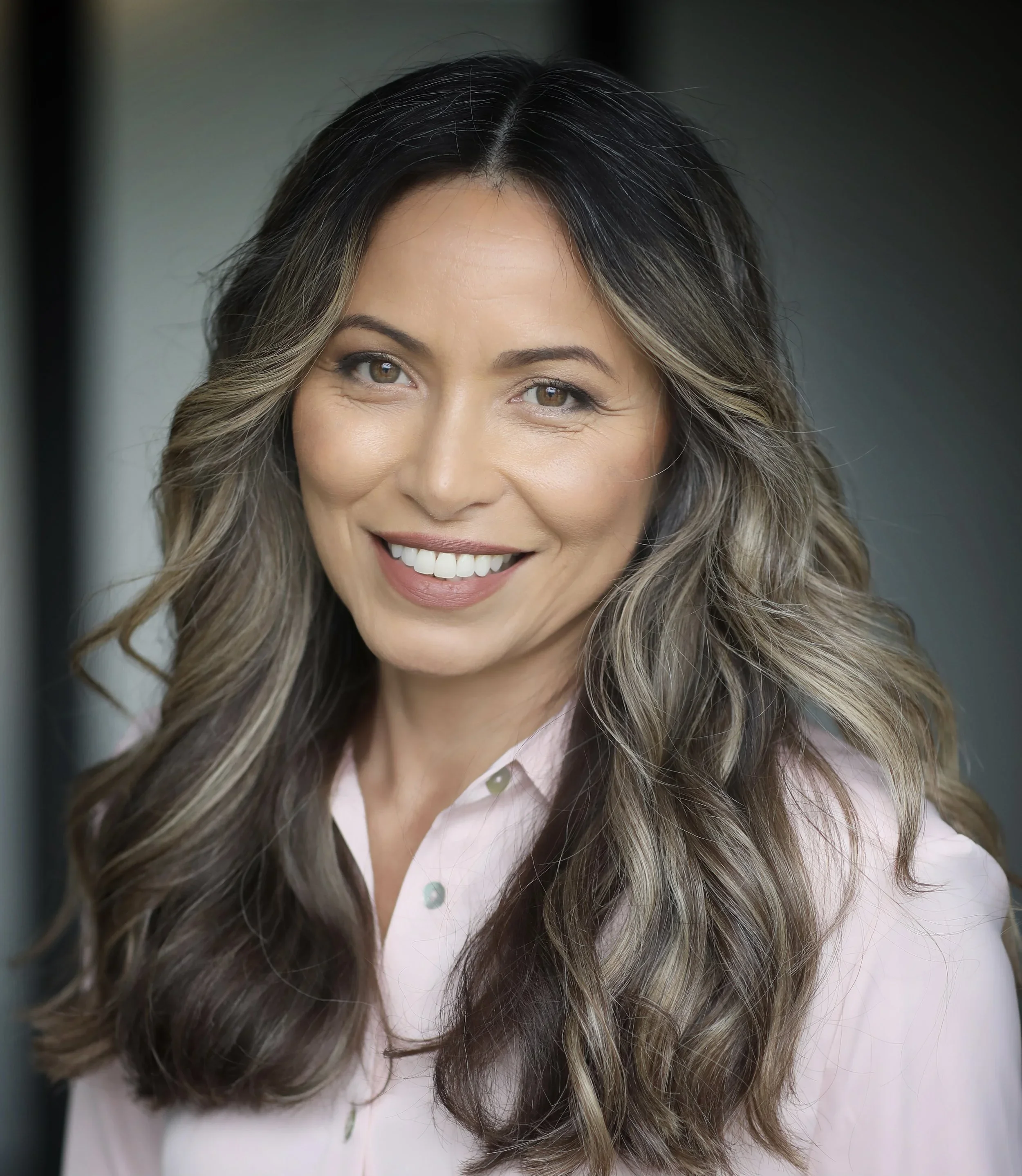 Headshot of Angela Fernandez, NP-C, MSN, MBA, a longevity medicine expert and hormone optimization specialist at Elite Redox with a background in Chemistry and Engineering.