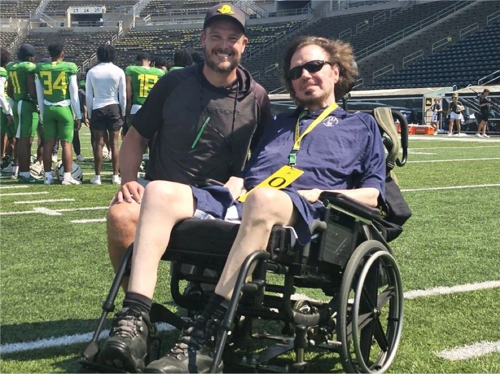 Ducks football head coach Dan Lanning and Jeff Young
