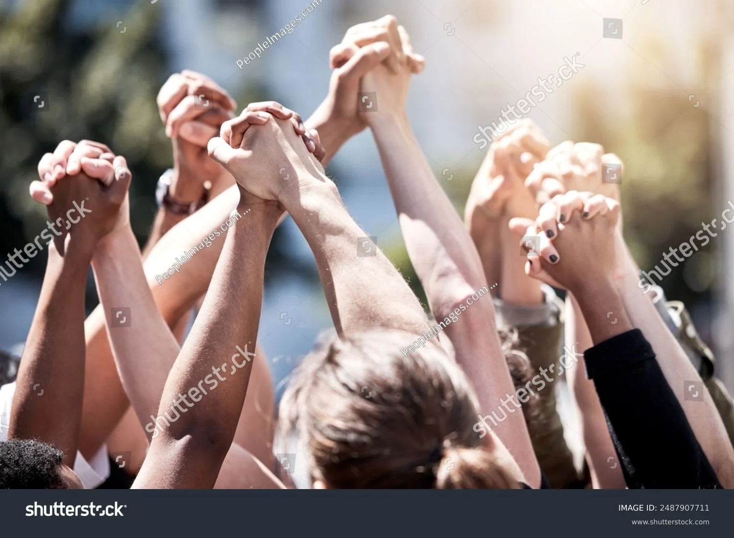 hands reaching up
