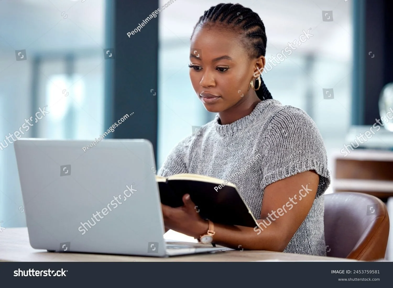 woman looking at laptop