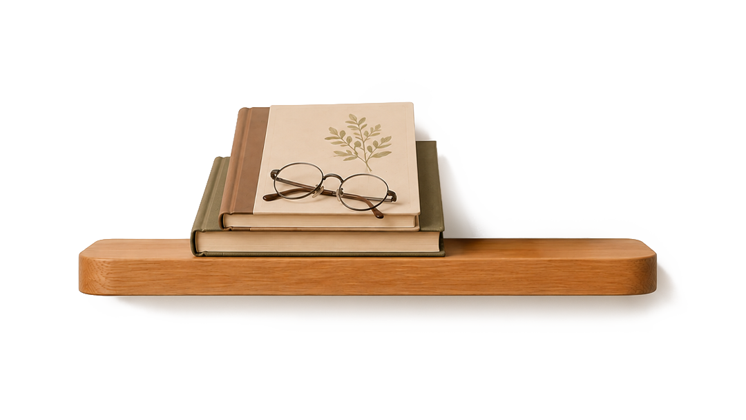 Stack of three hardcover books, with eyeglasses resting on top, placed on a wooden shelf.